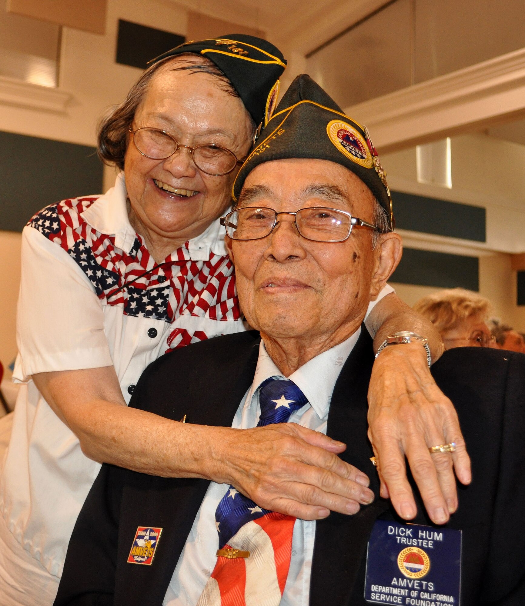 TRAVIS AIR FORCE BASE, Calif. -- Col. (ret) Dick Hum, shown here with his wife, Jane Ng, as they shared a moment of joy and laughter at 2010's Operation Gratitude champagne brunch, at the California Veterans Home, Yountville,  passed away May 22, after a brief illness, at the age of 86. A memorial service and burial with full military honors was held at the Yountville Veterans Home for Col. Hum, May 28th. 
(U.S. Air Force photo/Senior Master Sgt. Ellen L. Hatfield)