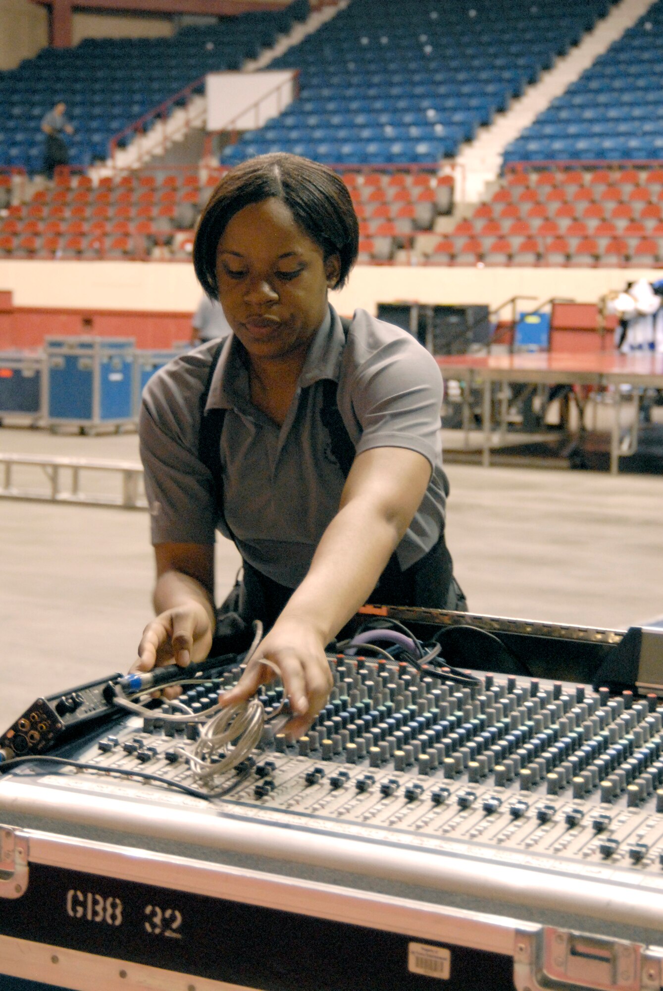 SAN ANGELO, Texas – Senior Airman Patrice Brown, Tops in Blue 2011 crew member, sets up the sound board May 31 at the San Angelo Coliseum.  This year’s show, Rhythm Nation, is June 1 at the coliseum.  Doors open at 6:30 p.m. and the show starts at 7 p.m..  (U.S. Air Force photo/Connie Hempel)