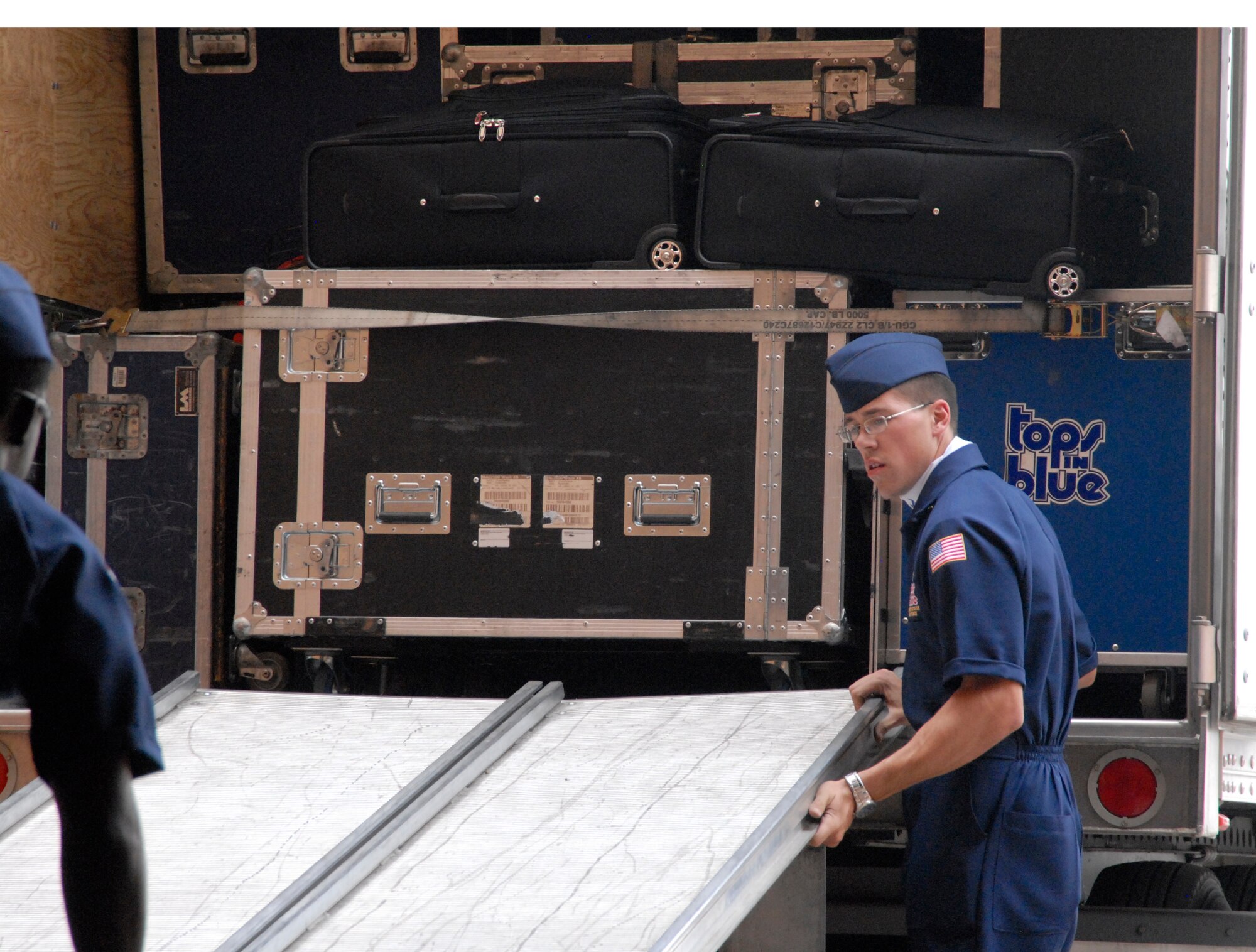 SAN ANGELO, Texas – Senior Airman Jerad Cremers, Tops in Blue 2011 crew member, readies one of two semi trucks for unloading May 31 at the San Angelo Coliseum.  The Tops in Blue 2011 Rhythm Nation performance is June 1 at the coliseum.  Doors open at 6:30 p.m. and the show starts at 7 p.m. (U.S. Air Force photo/Connie Hempel)