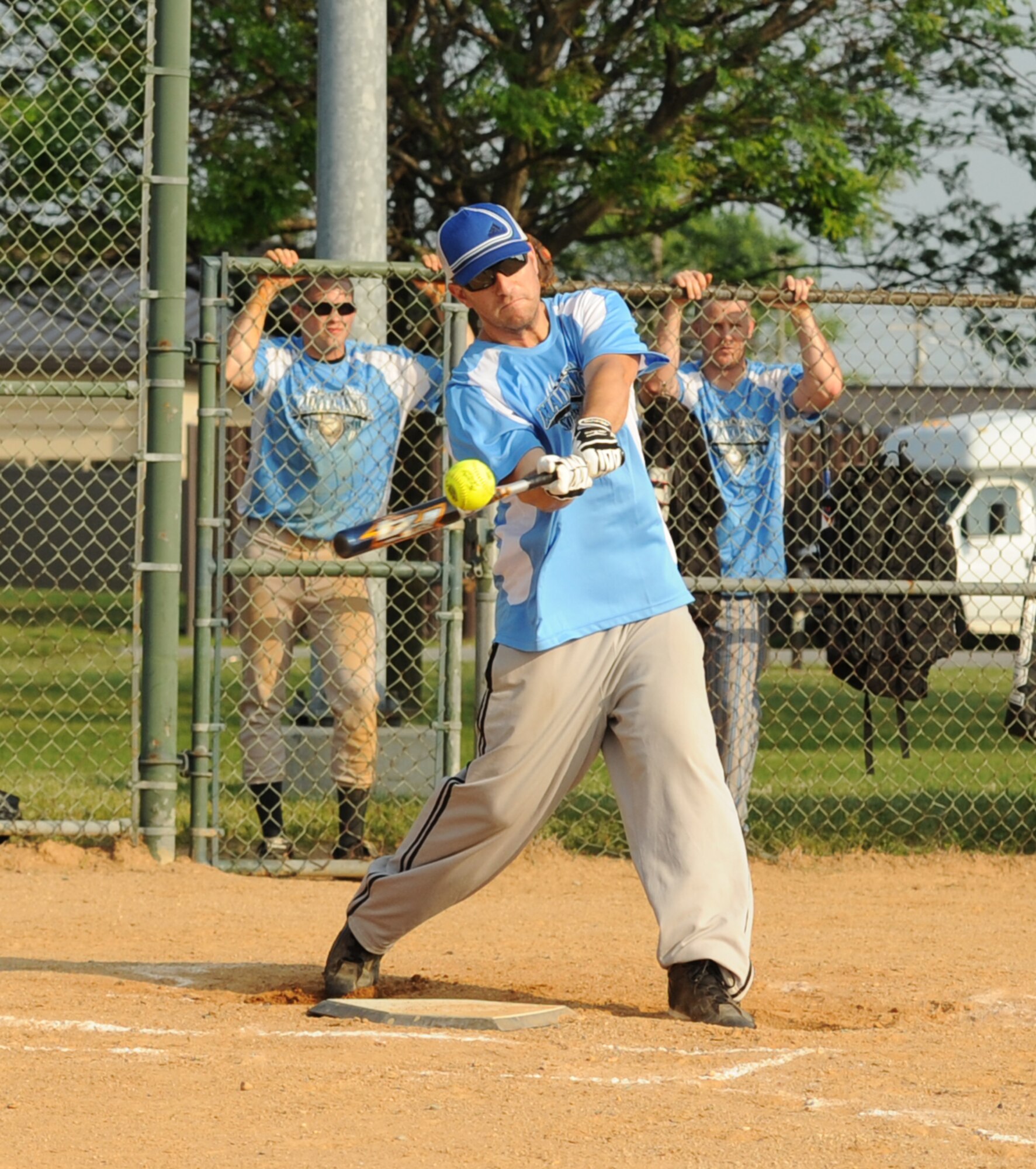 Vincent Marinelli, 436th Maintenance Squadron right fielder, hits against the 9th Airlift Squadron during the first game of the season May 31, 2011.  436 MXS A defeated 9 AS with a final score of 19 – 9.  (U.S. Air Force photo by Staff Sgt. Chad Padgett)