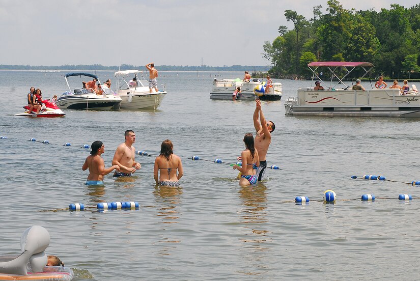 Patrons enjoy swimming and boating at Short Stay Navy Outdoor Recreation Area at Lake Moultrie near Moncks Corner, S.C., May 28.  Short Stay has a beach, boat dock, boat rentals and camping available to DoD patrons.  (U.S. Navy photo/Machinist's Mate 3rd Class Brannon Deugan)
