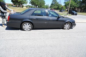 Last month an individual driving onto Joint Base Charleston was instructed to return to the Visitor's Center to obtain a pass. The driver
disobeyed the instructions of Security Forces personnel and attempted to enter the base. As a result, the Cat Claw tire shredders were deployed and immobilized
the vehicle. Security Forces personnel are on-duty for your protection and safety. While on Joint Base Charleston,, remember, please follow all Security Forces instructions. 