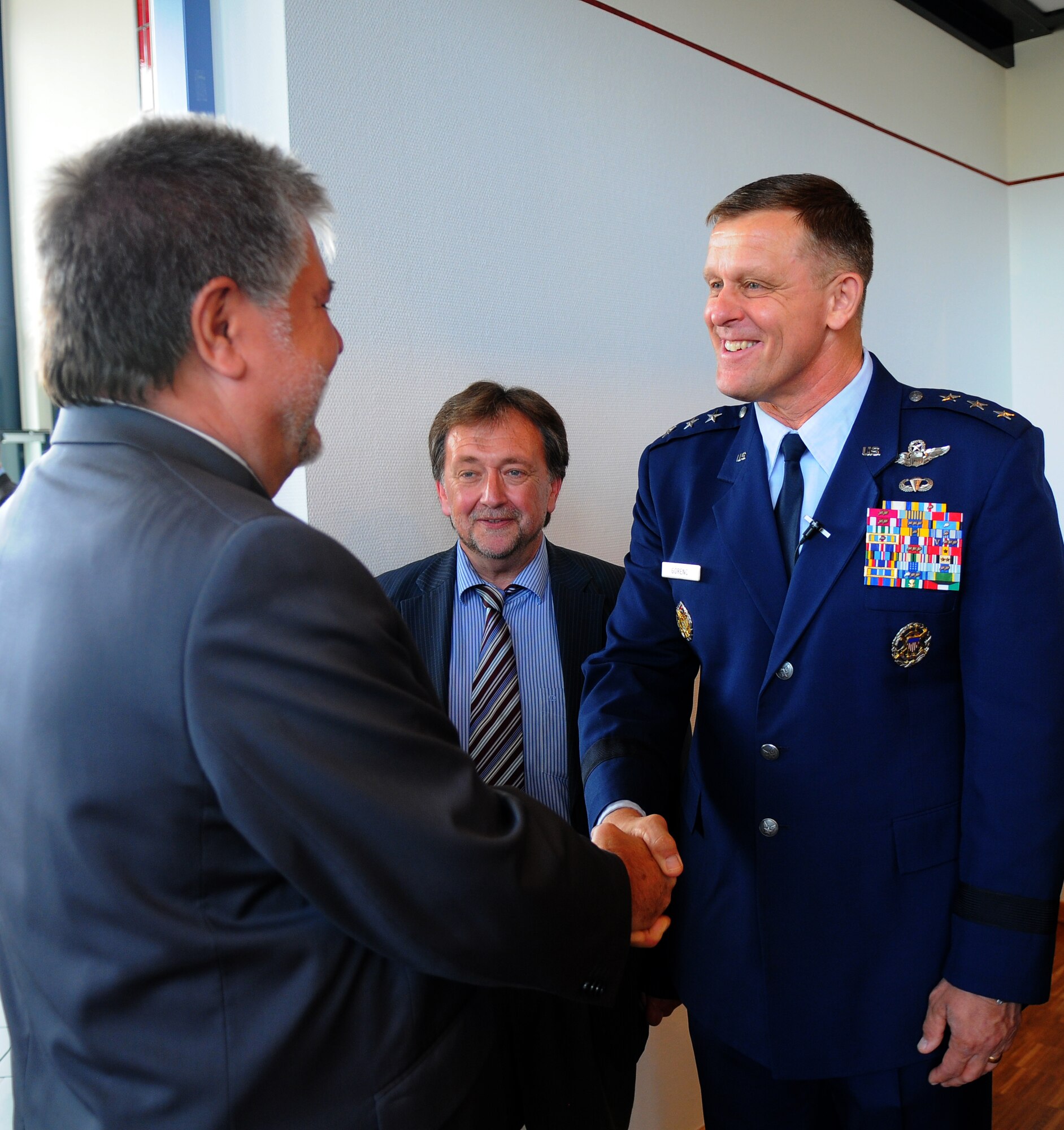 PRUEM, Germany – Lt. Gen. Frank Gorenc, 3rd Air Force commander, greets Kurt Beck, Rheinland-Pfalz minister president, at a military reception hosted by the 52nd Fighter Wing following a tour of the Rheinland-Pfalz Day Fair in Pruem, Germany, May 28. The Rheinland-Pfalz Day Fair is a three-day festival with entertainment, informational booths and other attractions. (U.S. Air Force photo/Airman 1st Class Dillon Davis)