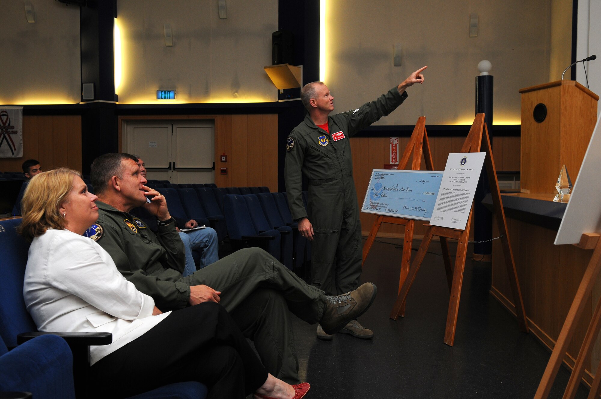 SPANGDAHLEM AIR BASE, Germany -- Col. Chris Weggeman, 52nd Fighter Wing commander, shows Lt. Gen. Frank Gorenc, 3rd Air Force commander, what project the Installation Execellence Award money will go towards. General and Mrs. Gorenc visited various facilities here to improve their understanding of the base's daily operations. (U.S. Air Force Photo/Airman 1st Class Dillon Davis)