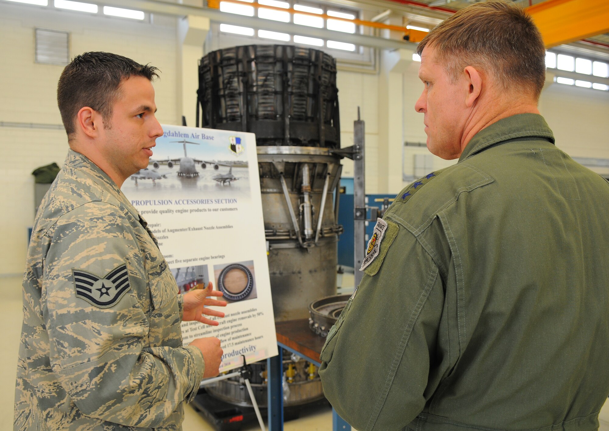 SPANGDAHLEM AIR BASE, Germany -- Staff Sgt. Patrick Deluca, 52nd Component Maintenance Squadron, explains the CMS accessory section to Lt. Gen. Frank Gorenc, 3rd Air Force commander, during the general's visit here May 28. General and Mrs. Gorenc visited various facilities on Spangdahlem AB to improve their understanding of the base's daily operations. (U.S. Air Force Photo/Airman 1st Class Dillon Davis)