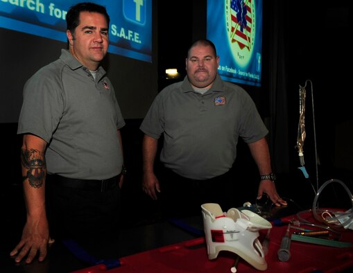 Joe McCluan and Scott McIntyre, firemen and paramedics with the Orlando Fire Department pose for a photo before delivering a safety briefing for Airmen and DOD members of the Kaiserslautern Military community, May 27, 2011, Ramstein AB, Germany. The Street Smart presentation is a straight forward safety demonstration on the consequences of poor choices and driving through Florida Stay Alive from Education (S.A.F.E.). (U.S. Air Force Photo by Tech. Sgt. Jocelyn L. Rich)