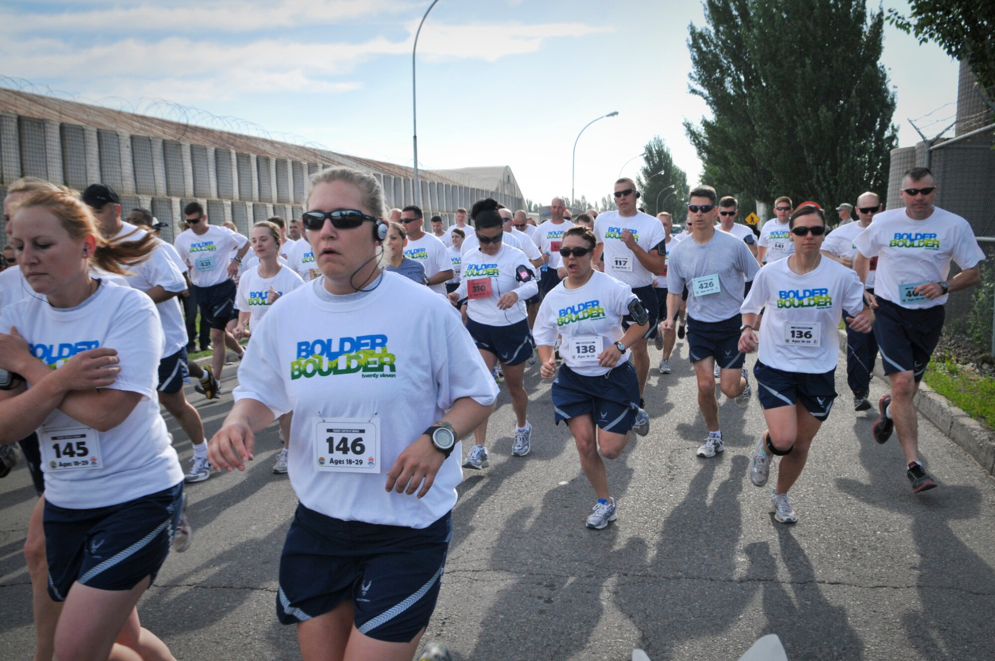TRANSIT CENTER AT MANAS, Kyrgyzstan - Service members deployed here run in the annual Bolder Boulder 10K race May 30.  The race here shadows the largest race in the U.S., which is held annually in Boulder, Colo.  Service members have their individual times displayed during the actual race in Boulder. (U.S. Air Force photo/Staff Sgt. Stacy Moless)