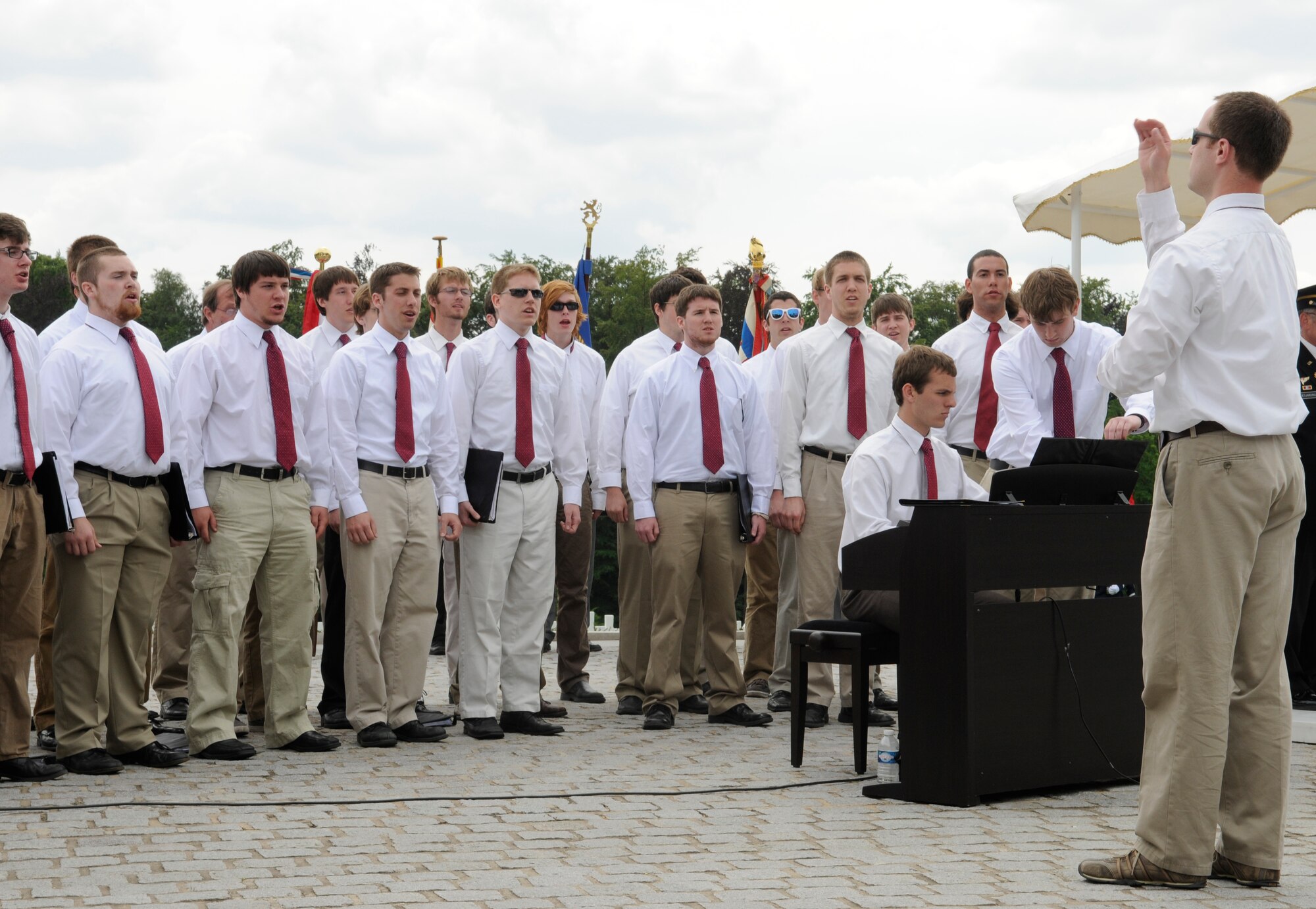 LUXEMBOURG – The Miami University Glee Club sings the Battle Hymn of the Republic during a Memorial Day service at the Luxembourg American Cemetery and Memorial in Luxembourg May 28. The cemetery and memorial is the final resting place for more than 5,000 U.S. service members, including Gen. George S. Patton. (U.S. Air Force photo/Staff Sgt. Benjamin Wilson)