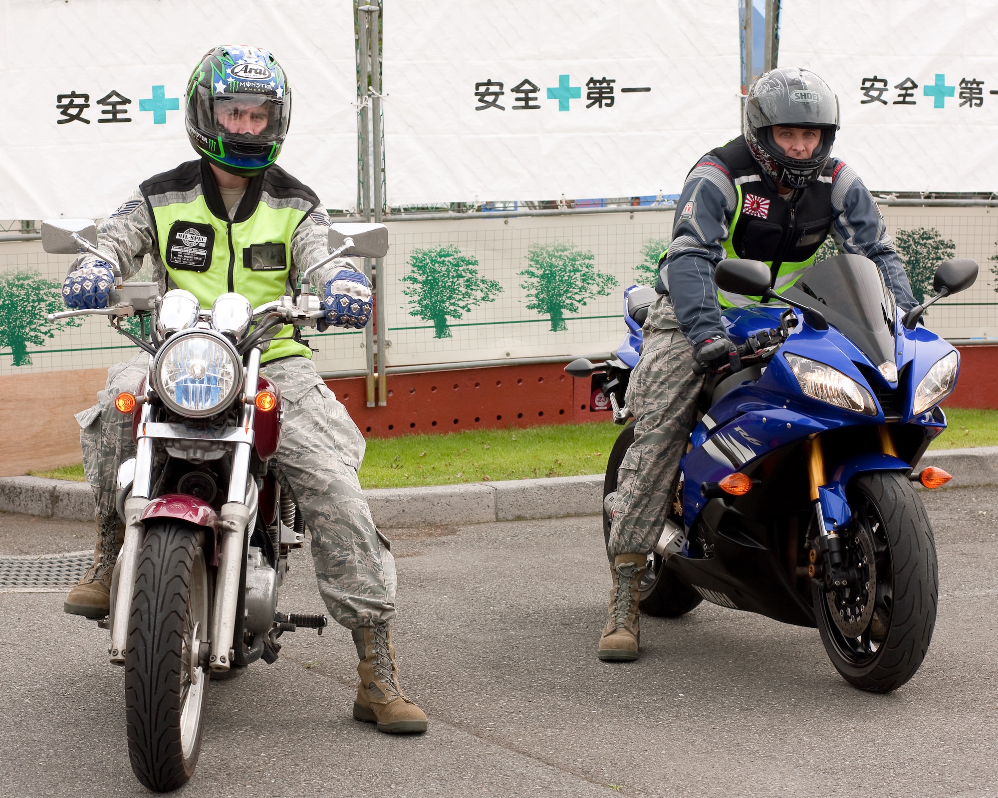 YOKOTA AIR BASE, Japan -- Tech. Sgt. Jason Scott, ground safety craftsman (left), and Tech. Sgt. Scott Roberts, flight safety noncommissioned officer, both from the 374th Airlift Wing Safety office, take all necessary safety measures while driving their motorcycles at Yokota Air Base, Japan, May 31, 2011. During the Critical Days of Summer campaign, base leadership urge all Airmen to exercise safe practices and make sound judgments on and off-duty. (U.S. Air Force photo/Osakabe Yasuo)
