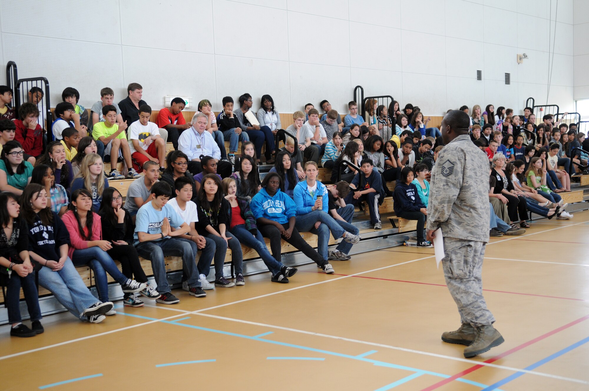 YOKOTA AIR BASE, Japan -- Master Sgt. Paul Thompson, 374th Civil Engineer Squadron electrical section chief, speaks to  Yokota Middle School 7th and 8th grade students  about the importance of energy conservation May 31, 2011 at Yokota Air Base, Japan.  (U.S. Air Force photo/Airman Krystal M. Garrett) 
