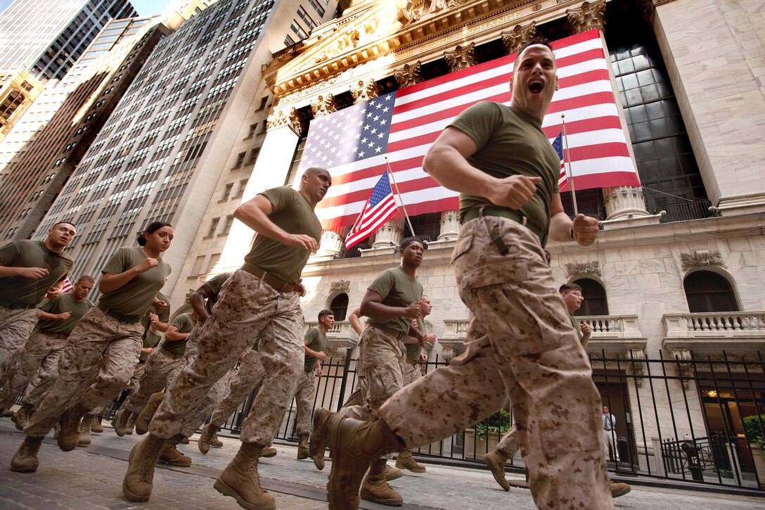 Marines lead a run to ground zero in New York, May 31, 2011. The Marines are assigned to the 24th Marine Expeditionary Unit, most of whom joined the service after the attacks of Sept. 11, 2001. More than 3,000 Marines, sailors and Coast Guardsmen are participating in community outreach events and equipment demonstrations during Fleet Week 2011.