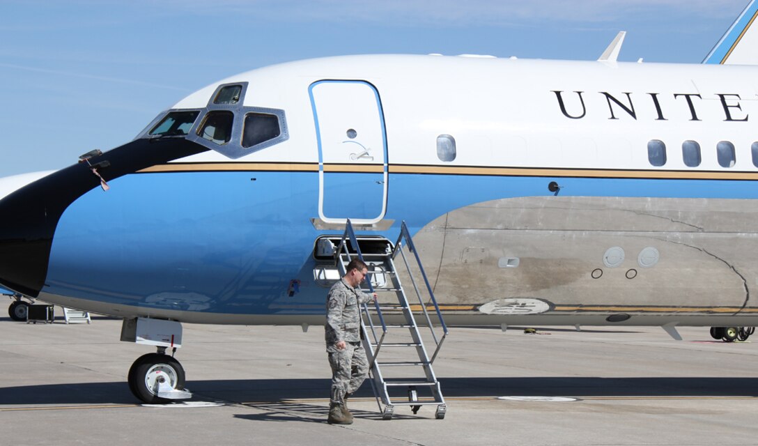 A maintainer from the 932nd Airlift Wing Maintenance Group finishes checking over the beautiful C-9C airplane before a mission at Scott Air Force Base.  (U.S. Air Force photo/Maj. Stan Paregien)