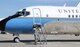 A maintainer from the 932nd Airlift Wing Maintenance Group finishes checking over the beautiful C-9C airplane before a mission at Scott Air Force Base.  (U.S. Air Force photo/Maj. Stan Paregien)