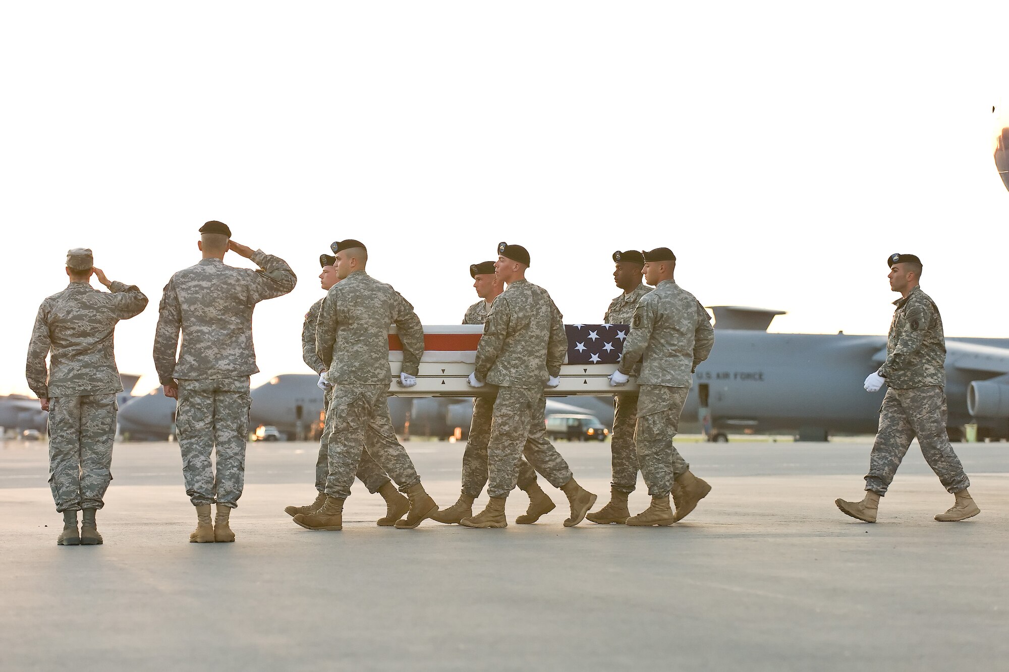 A U.S. Army carry team transfers the remains of Army Spc. Richard C. Emmons III, of North Granby, Conn., at Dover Air Force Base, Del., June 2, 2011. Emmons was assigned to the 2nd Battalion, 30th Infantry Regiment, 4th Brigade Combat Team, 10th Mountain Division, Fort Polk, La. (U.S. Air Force photo/Roland Balik)