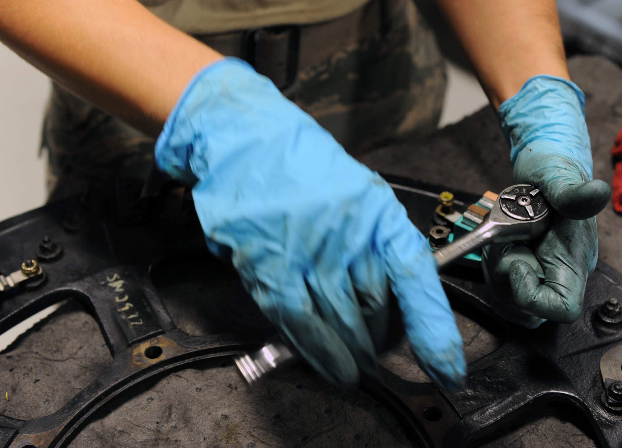 Senior Airman Sarah Briest, a 19th Component Maintenance Squadron aerospace propulsion journeyman, performs maintenance on a de-icer contact ring May 31, 2011, at Little Rock Air Force Base, Ark. Performing inspection and maintenance on the de-icer ring is part of rebuilding a C-130 propeller. (U.S. Air Force photo by Airman 1st Class Rusty Frank) 