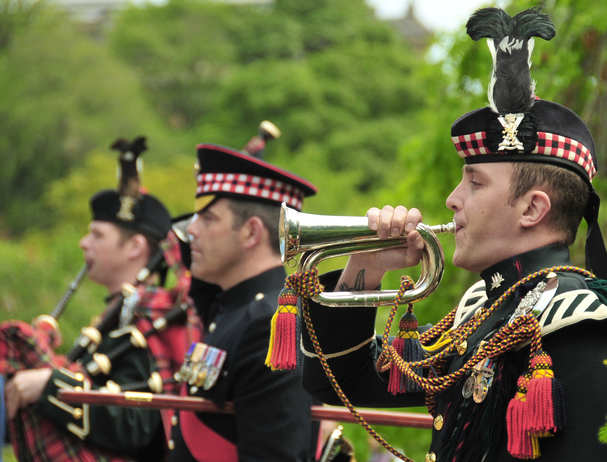 A bagpiper from the British Army's Royal Scots Dragoon Guards participates a Memorial Day ceremony honoring fallen heroes at the Scottish-American War Memorial in Edinburgh, Scotland on May 30. The 48th Fighter Wing Honor Guard participated in the 77th annual Scottish-American Memorial Day service at the "The Call," a war memorial, presented to the Scottish people by the U.S., as a tribute to World War I Scottish troops. (U.S. Air Force photo/ Staff Sgt. Megan P. Lyon)