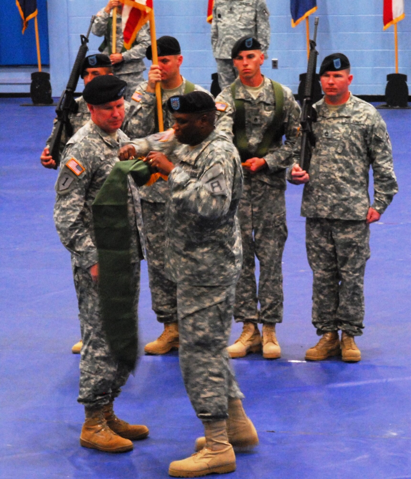 Col. Chipper Lewis, 174th Infantry Brigade commander, and Command Sgt. Maj. Joe Zanders, case the brigade’s colors for movement to Joint Base McGuire-Dix-Lakehurst, during a ceremony May 20 at Fort Drum, N.Y. The casing ends a 42-year tenure for the 174th In. Bde. at Fort Drum. (Courtesy photo/Released)