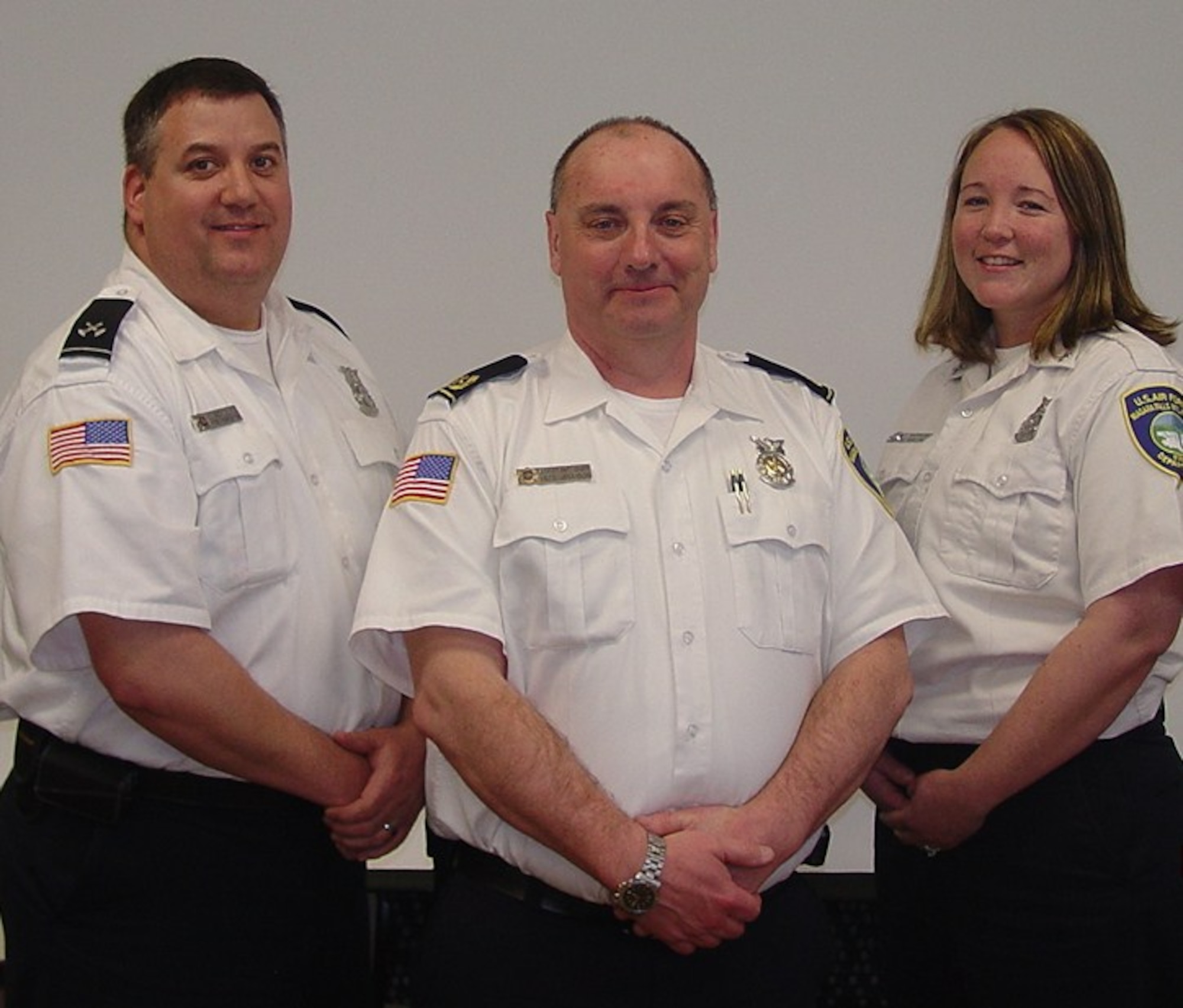 Inspector, John Schultz(far left); Asst. Chief Peter Jellison; Inspector Christina Shepherd are part of the team that was instrumental in the Niagara Falls Air Reserve Station Fire Department earning the award of 2010 Air Force Reserve CommandFire Prevention Program of the Year. (Courtesy photo0