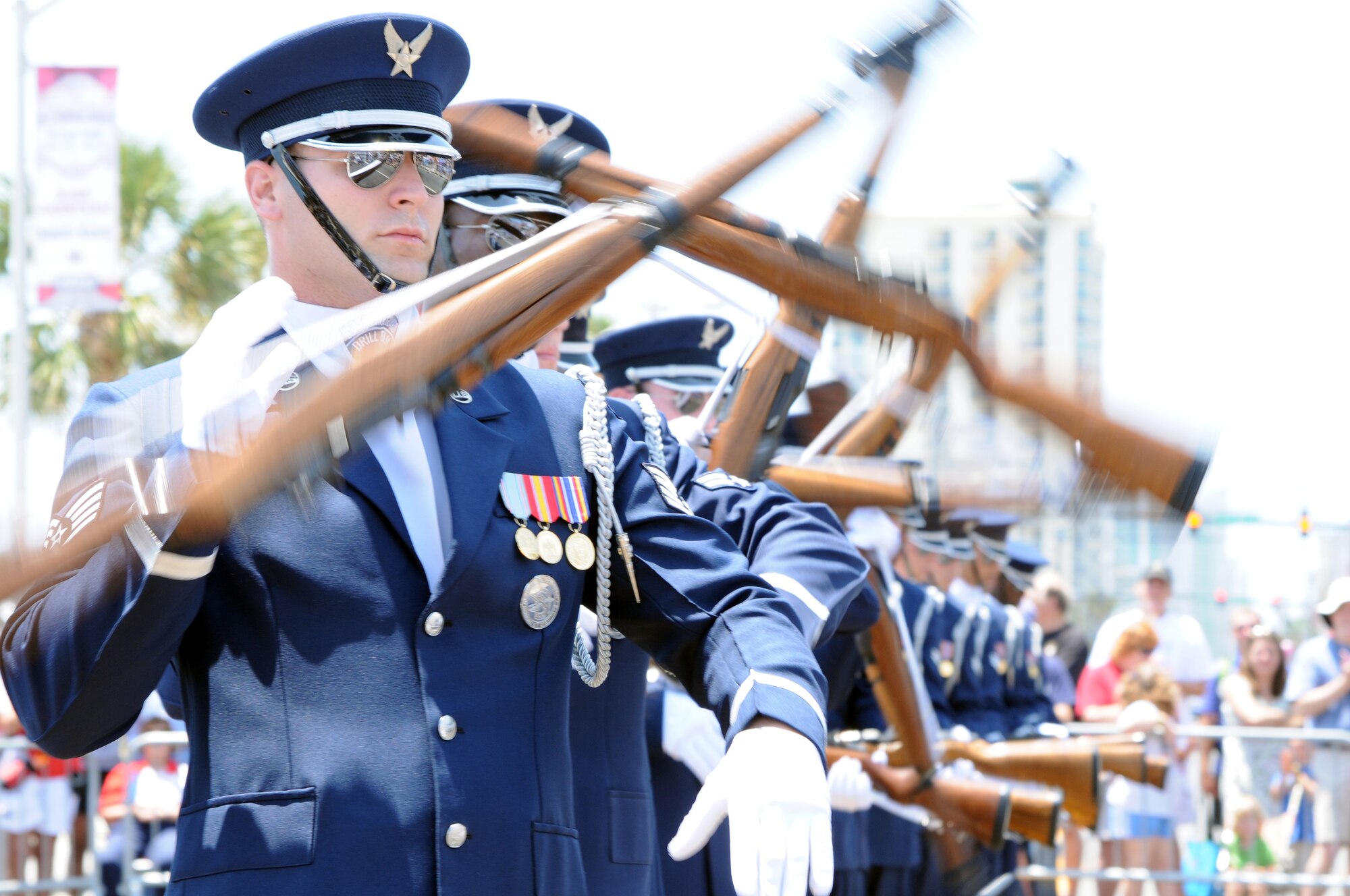 Staff Sgt. Mark Freda, member of the U.S. Air Force Honor Guard Drill Team, spins his M-1 rifle in the air May 28 for the Myrtle Beach, S.C., Memorial Day celebrations. The USAF Honor Guard drill team has participated in 28 performances this year. (U.S. Air Force photo by Airman 1st Class Tabitha N. Haynes)