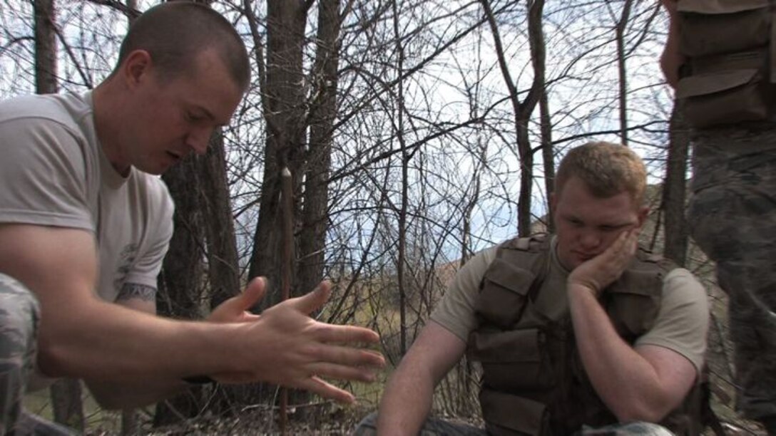 The 934th Operations Group, SERE (Search, Escape, Survival and Evasion) 

instructor, Staff Sgt. Adam Craft conducts survival skill techniques at the Arden 

Hills training area with aircrew members from the 934th Aeromedical 

Evacuation Squadron. Survival skills training is required for all aircrew members. (Air Force Photo/Wendy Cormier)

Their focus was prioritizing their needs, navigation and fire starting techniques.
