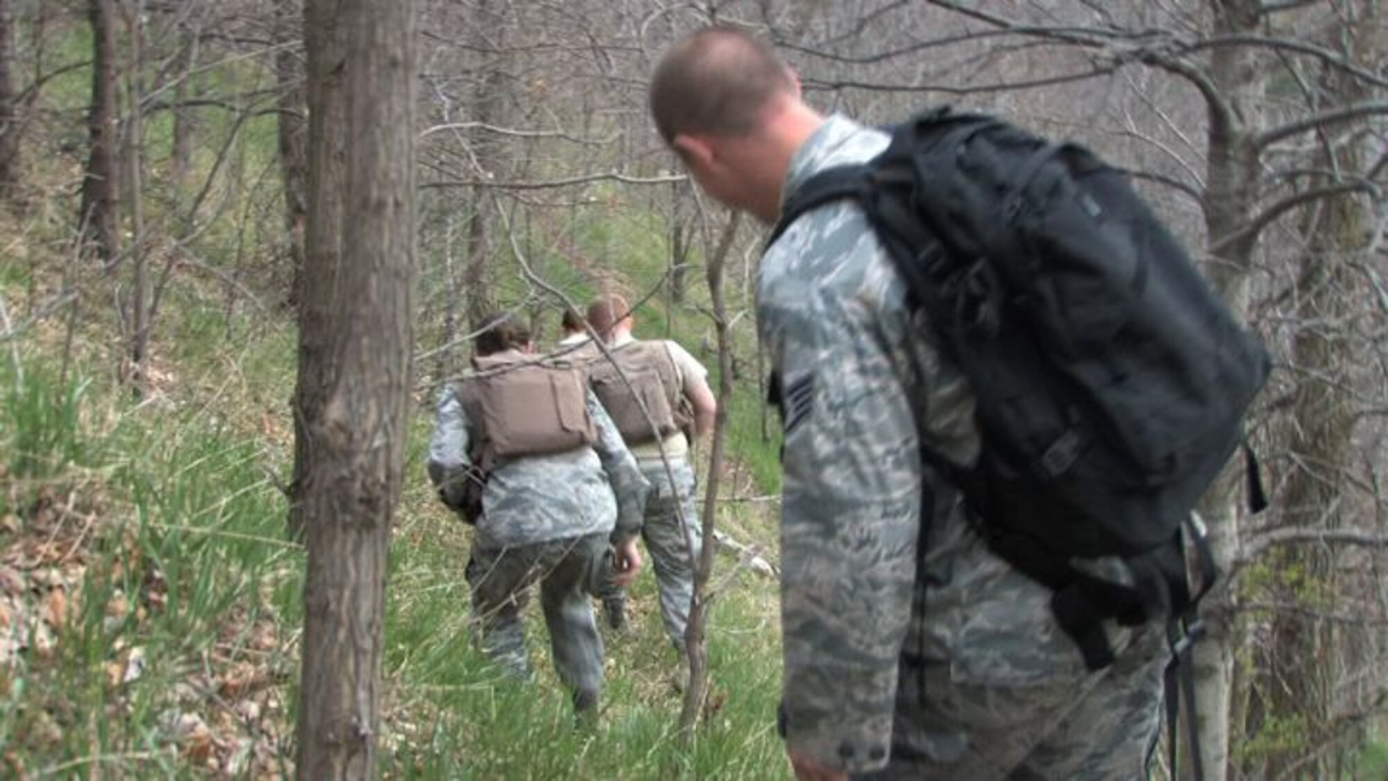 The 934th Operations Group, SERE (Search, Escape, Survival and Evasion) 

instructor, Staff Sgt. Adam Craft conducts survival skill techniques at the Arden 

Hills training area with aircrew members from the 934th Aeromedical 

Evacuation Squadron. Survival skills training is required for all aircrew members. (Air Force Photo/Wendy Cormier)

Their focus was prioritizing their needs, navigation and fire starting techniques.
