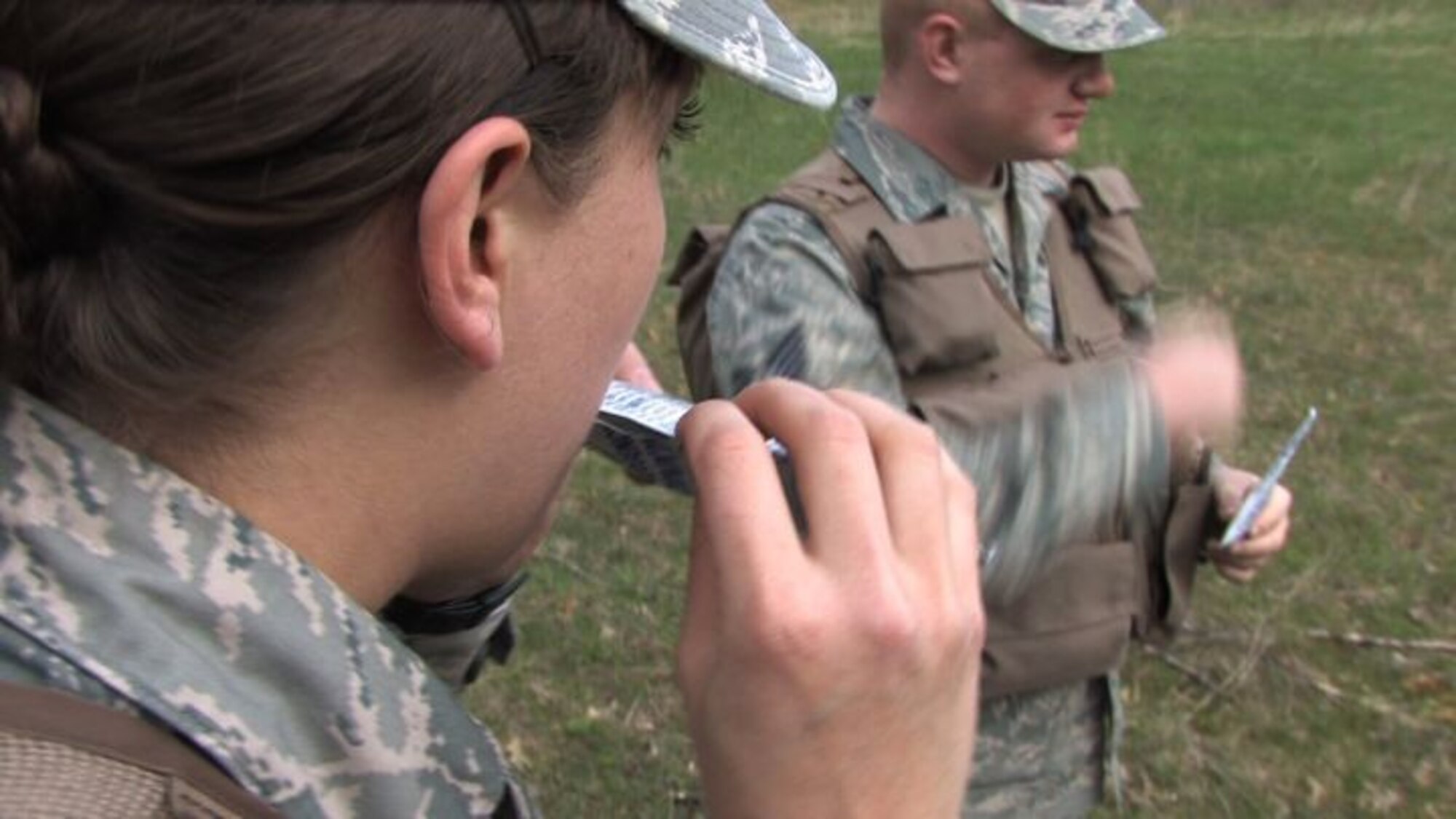 The 934th Operations Group, SERE (Search, Escape, Survival and Evasion) 

instructor, Staff Sgt. Adam Craft conducts survival skill techniques at the Arden 

Hills training area with aircrew members from the 934th Aeromedical 

Evacuation Squadron. Survival skills training is required for all aircrew members. (Air Force Photo/Wendy Cormier)

Their focus was prioritizing their needs, navigation and fire starting techniques.
