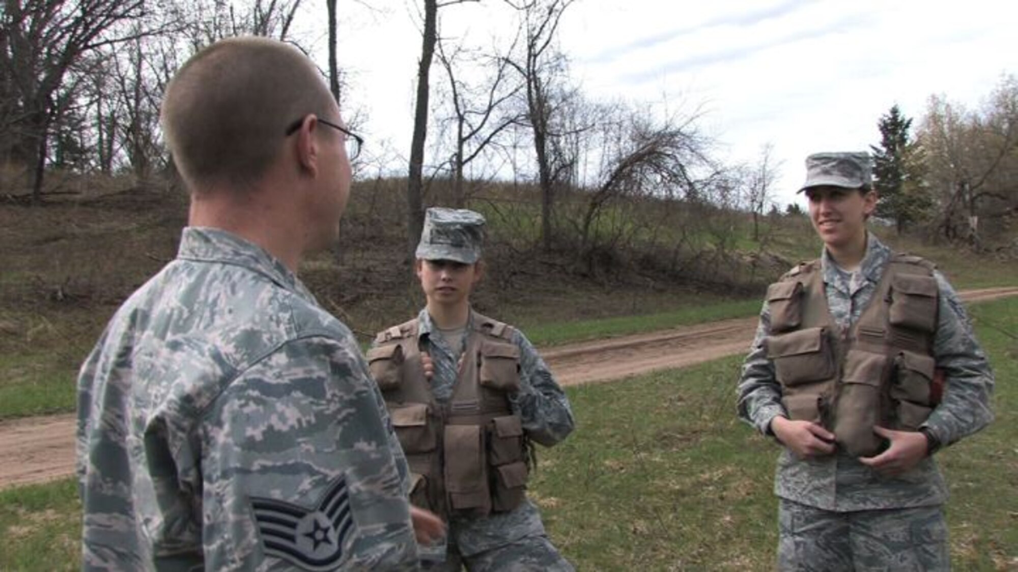 The 934th Operations Group, SERE (Search, Escape, Survival and Evasion) 

instructor, Staff Sgt. Adam Craft conducts survival skill techniques at the Arden 

Hills training area with aircrew members from the 934th Aeromedical 

Evacuation Squadron. Survival skills training is required for all aircrew members. (Air Force Photo/Wendy Cormier)

Their focus was prioritizing their needs, navigation and fire starting techniques.
