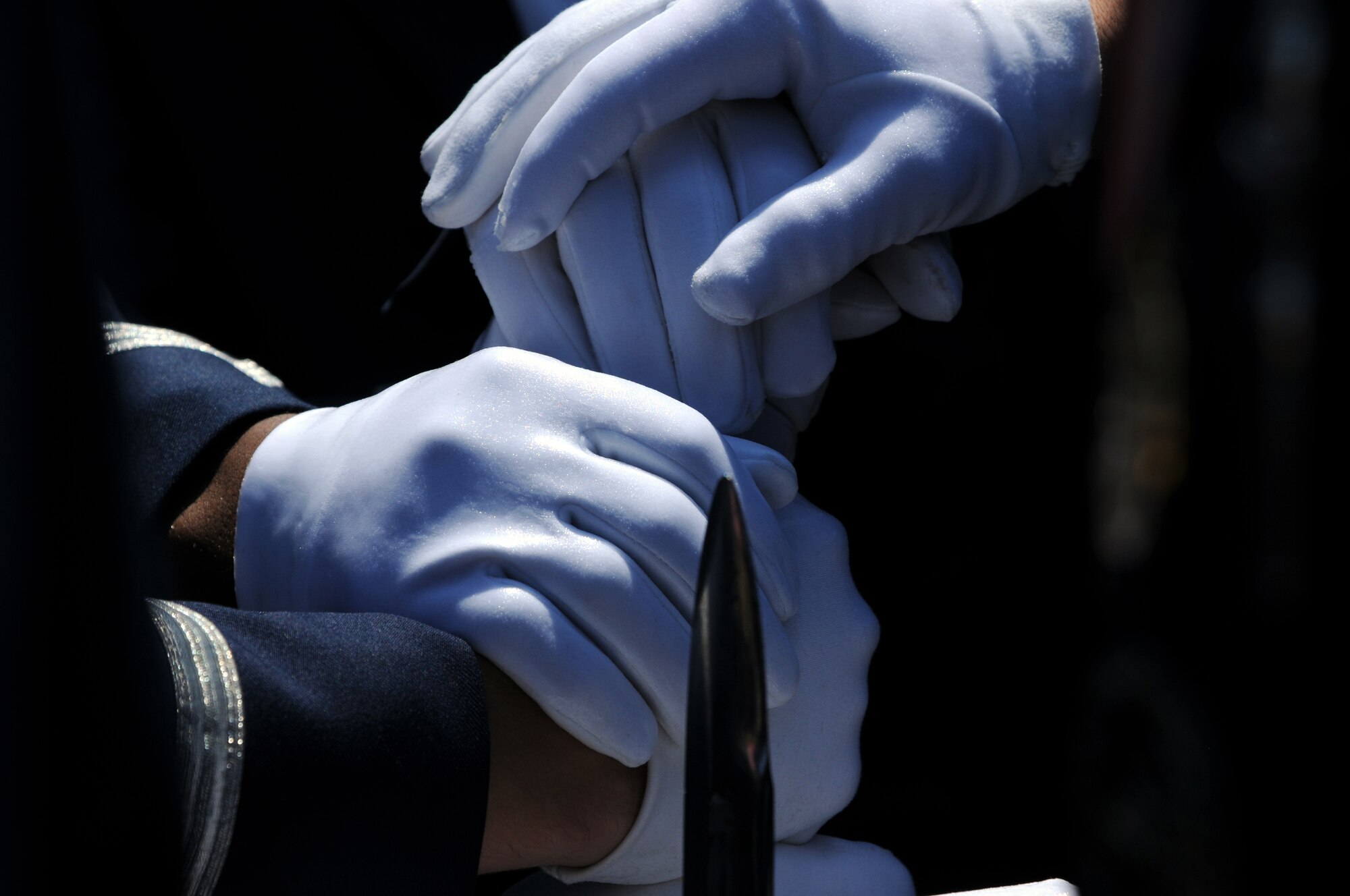 Members of the U.S. Air Force Honor Guard Drill Team gather together before their performance for the Myrtle Beach, S.C., Memorial Day celebrations May 28. Myrtle Beach dedicated May to honor servicemembers, naming it Military Appreciation Month. The (U.S. Air Force photo by Airman 1st Class Tabitha N. Haynes)
