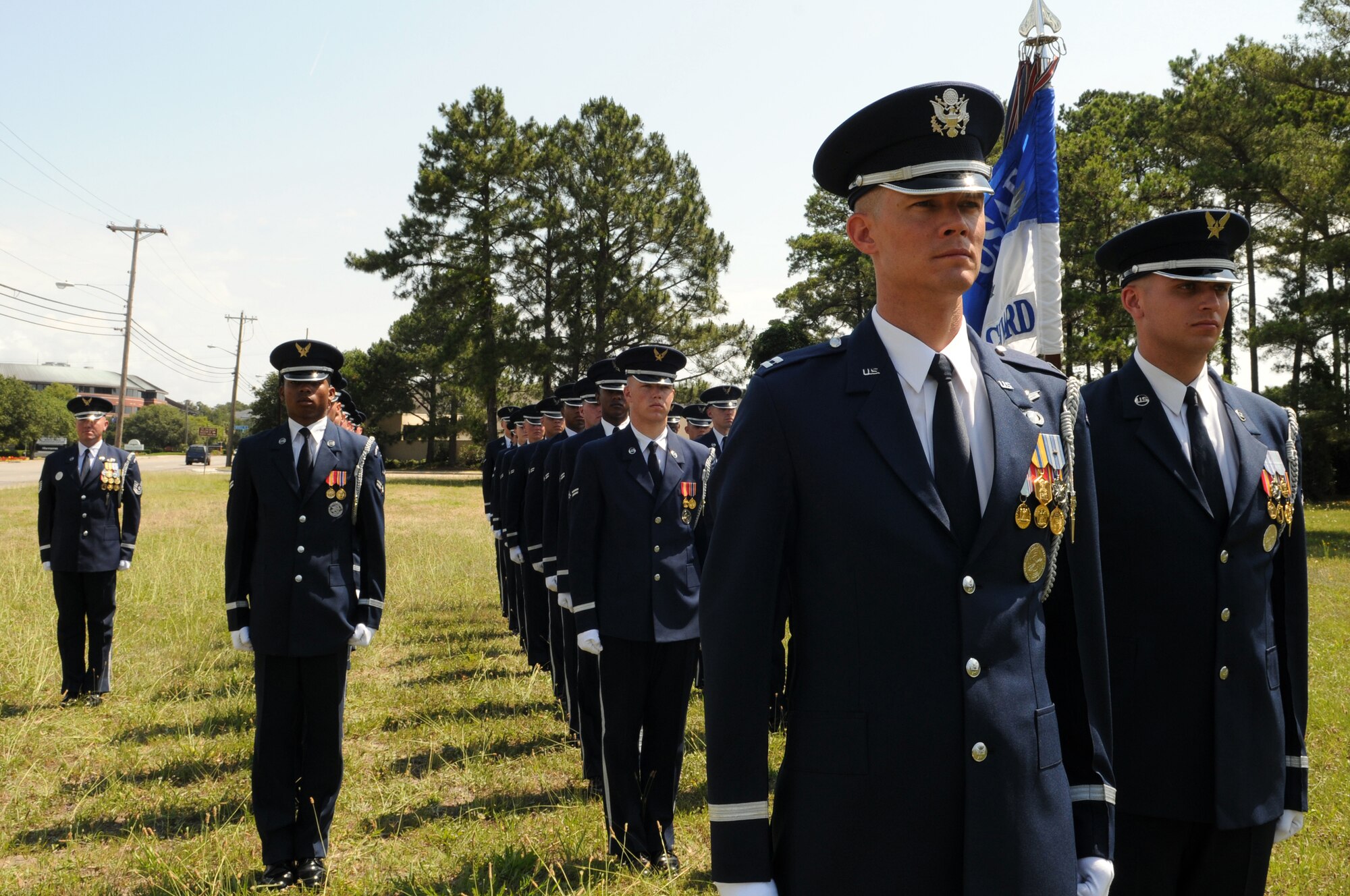 Capt. Justin Hochstein, commander of the U.S. Air Force Drill Team and officer in charge of the parade flight, stands at attention with his flight May 28 following their participation in the Myrtle Beach, S.C., Memorial Day parade. The USAF Honor Guard parade flight has participated in 11 events this year. (U.S. Air Force photo by Airman 1st Class Tabitha N. Haynes)