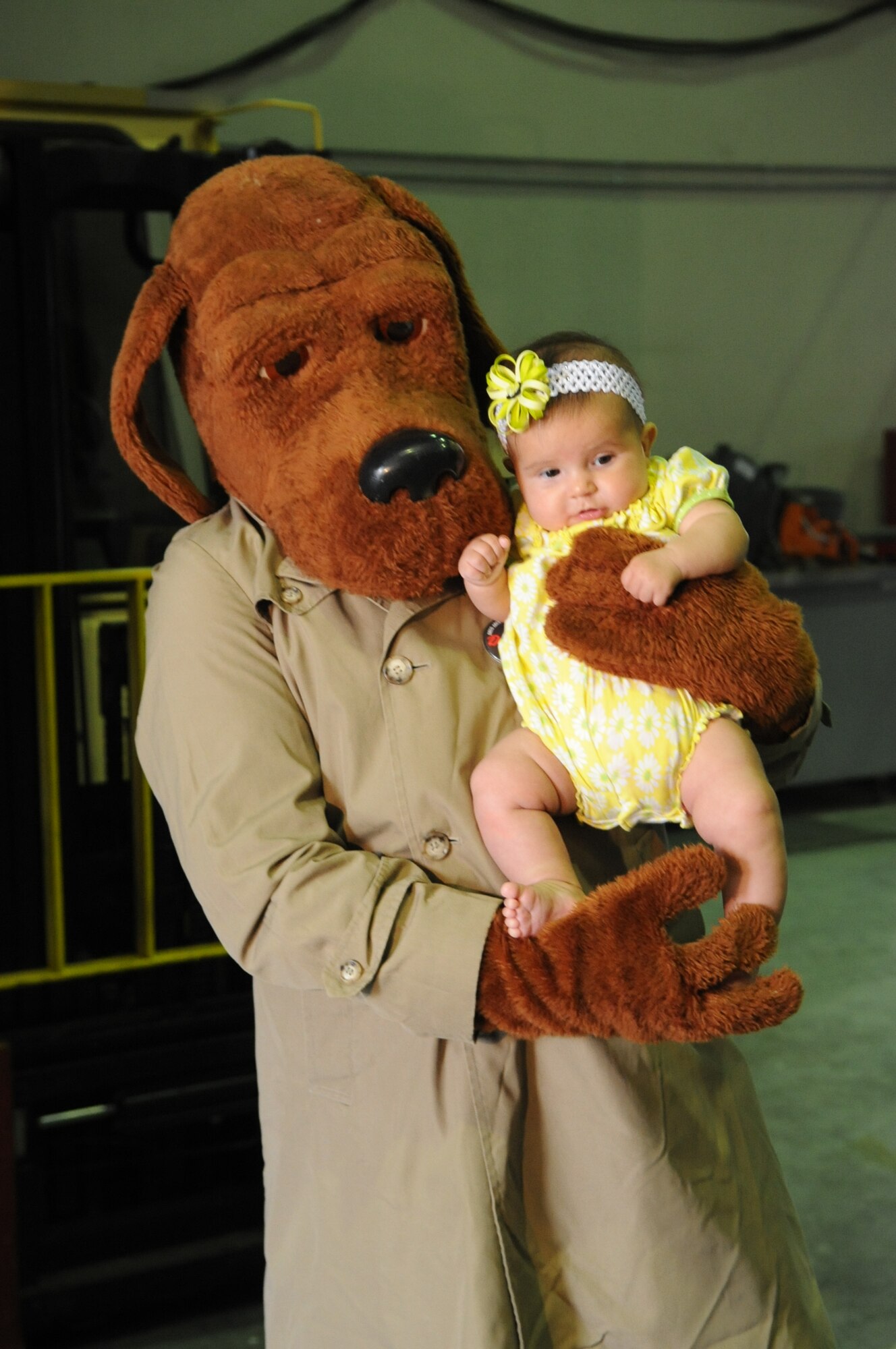 McGruff the Crime Dog poses with Raven Marie Green during a Security Forces open house May 18, 2011 at Incirlik Air Base, Turkey.  The open house was one of multiple events hosted by the 39 SFS in observation of National Police Week. National Police Week was first observed in 1962 when President John F. Kennedy officially declared May 15 National Peace Officers' Memorial Day. (U.S. Air Force photo by Airman 1st Class Clayton Lenhardt/Released)