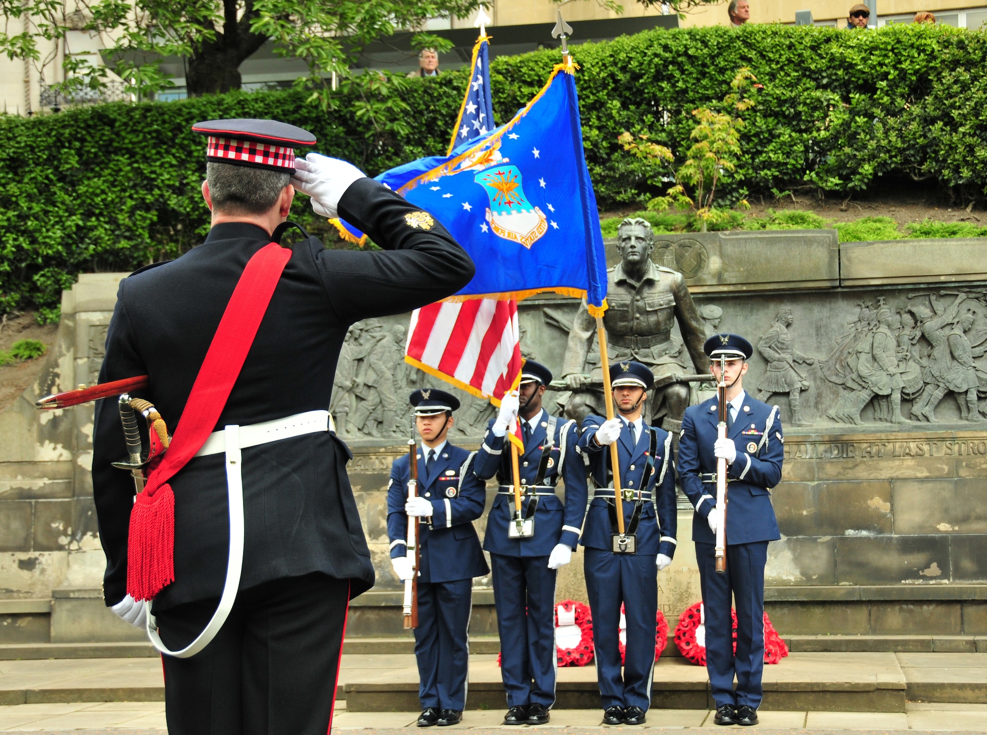 EDINBURGH, Scotland -- Garrison Sgt. Maj. Graham White, Headquarters Edinburgh Garrison, Edinburgh Castle, salutes the 48th Fighter Wing Honor Guard during a Memorial Day ceremony honoring fallen heroes at the Scottish-American War Memorial in Edinburgh, Scotland on May 30. This year marks the 77th annual Scottish-American Memorial Day service at "The Call," a war memorial presented to the Scottish people by the U.S., as a tribute to World War I Scottish troops. (U.S. Air Force photo/ Staff Sgt. Megan P. Lyon)