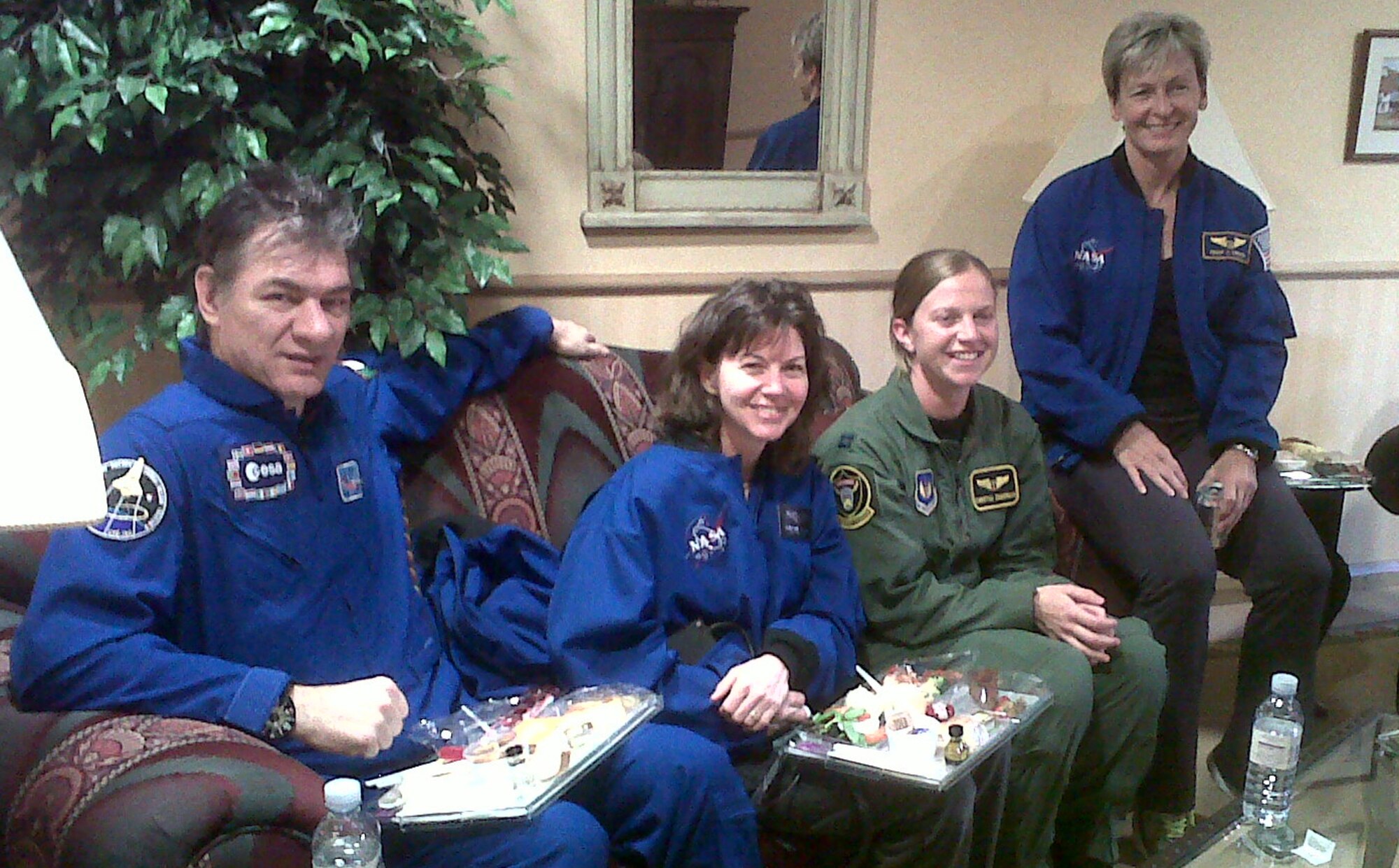ROYAL AIR FORCE Mildenhall, England - Paolo Nespoli(left), European Space Agency astronaut, and Catherine Coleman, National Aeronautics and Space Administration astronaut, relax at the RAF Lakenheath Hospital accompanied by 48th Medical Group personnel after landing in RAF Mildenhall on May 23, 2010. The astronauts transited through RAF Mildenhall to refuel and rest after returning from a six month mission in the International Space Station. They were greeted by 48th MDG personnel to support them for any possible health issues resulting from their return to a gravity environment.  (Courtesy Photo)