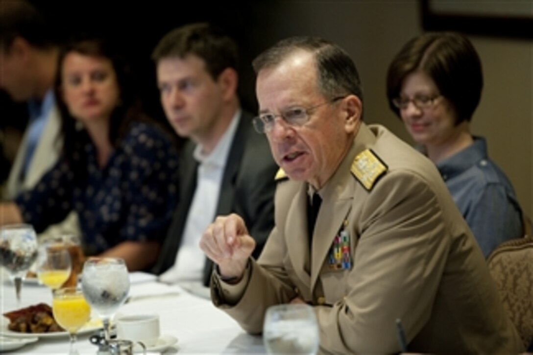 Chairman of the Joint Chiefs of Staff Adm. Mike Mullen speaks with members of the press at a Defense Writers' Group working breakfast at the Fairmont Hotel in Washington, D.C., on June 2, 2011.  
