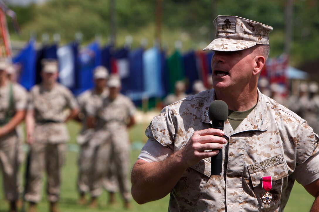 Robert E. Braithwaite, the executive director for Marine Forces Reserve, stands and admires the virtual simulator room of the MarForRes Center for Safety Excellence after the ribbon cutting ceremony here, June 2.