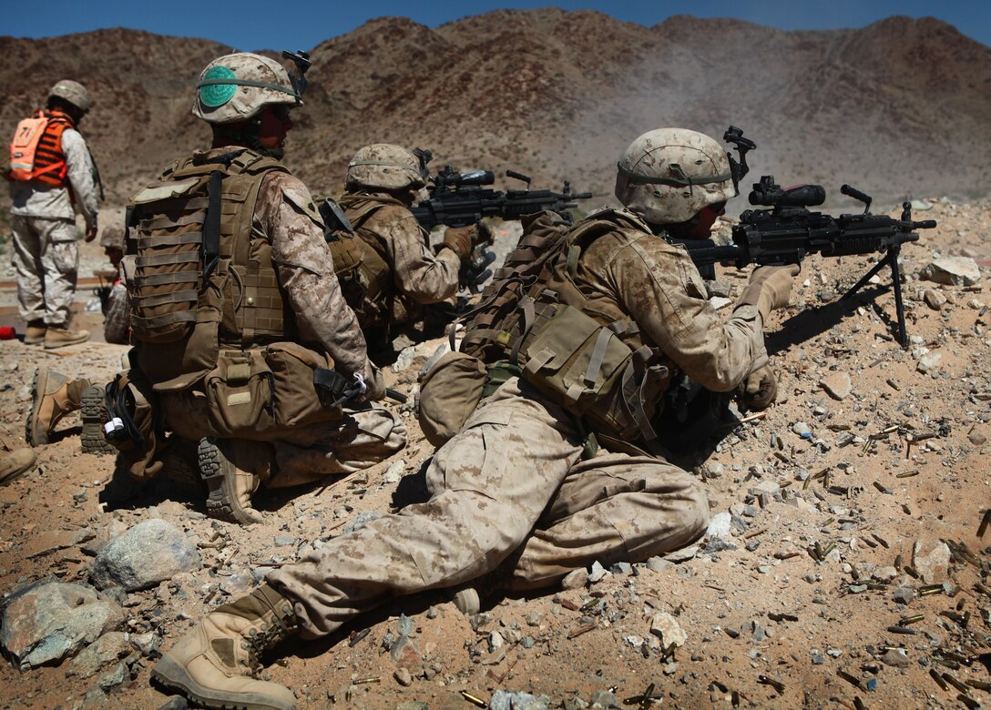 Marines with 2nd platoon, Company B, 1st Battalion, 6th Marine Regiment, 2nd Marine Division, provide suppressing fire during the platoon attack course aboard Marine Corps Base 29 Palms, Calif., June 3, 2011. The exercise, part of the Enhanced Mojave Viper training evolution, serves to familiarize the Marines with operations from the platoon level, down to the four-man fireteam, increasing the unit’s ability to operate independently on several fronts.