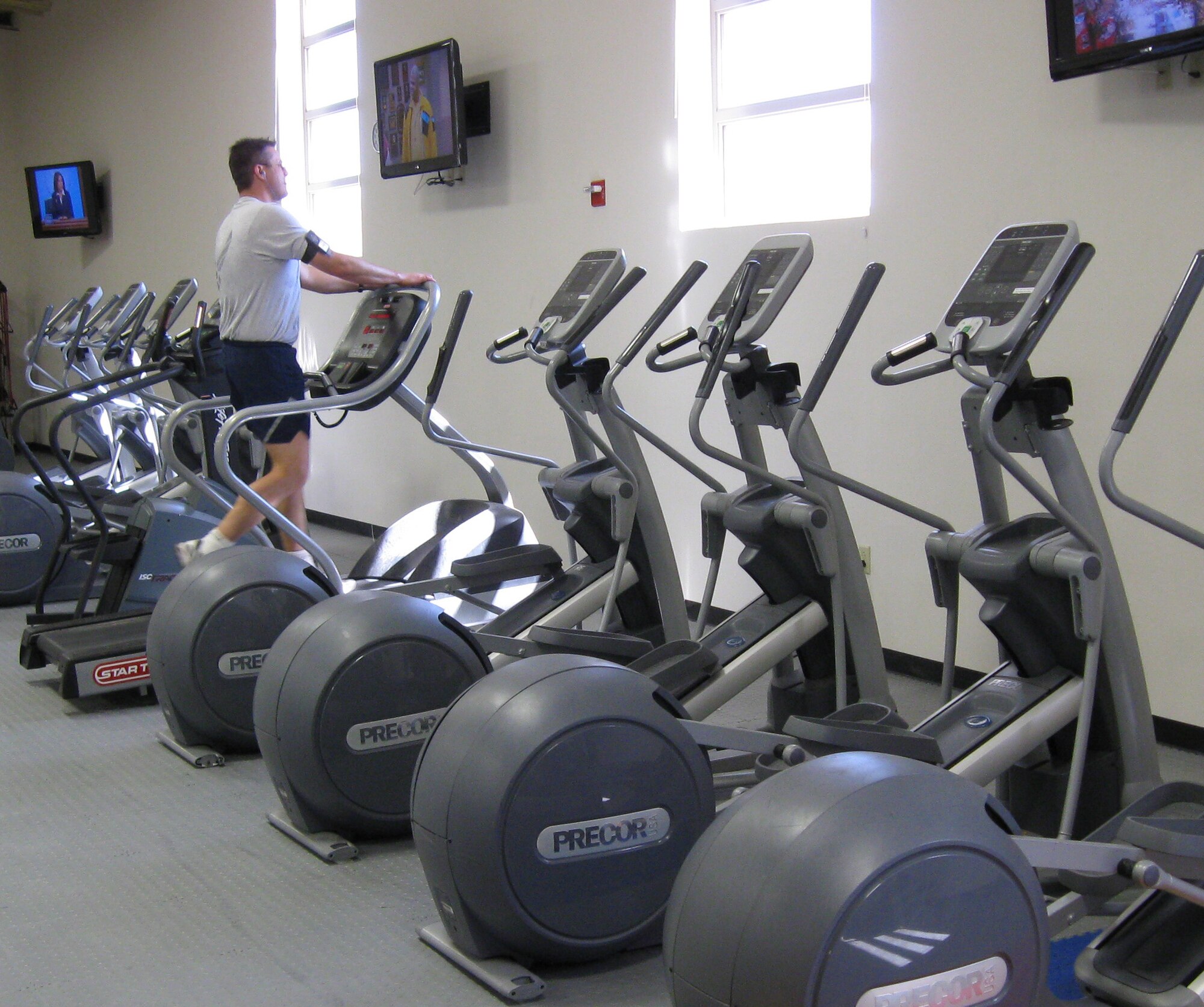 An Airmen exercises on the treadmill at the flight line gym. The flight line gym is a great tool maintainers – and other Airmen with flight line access - can use to get a workout during their busy workdays and ensure they stay in shape. (U.S. Air Force courtesy photo)