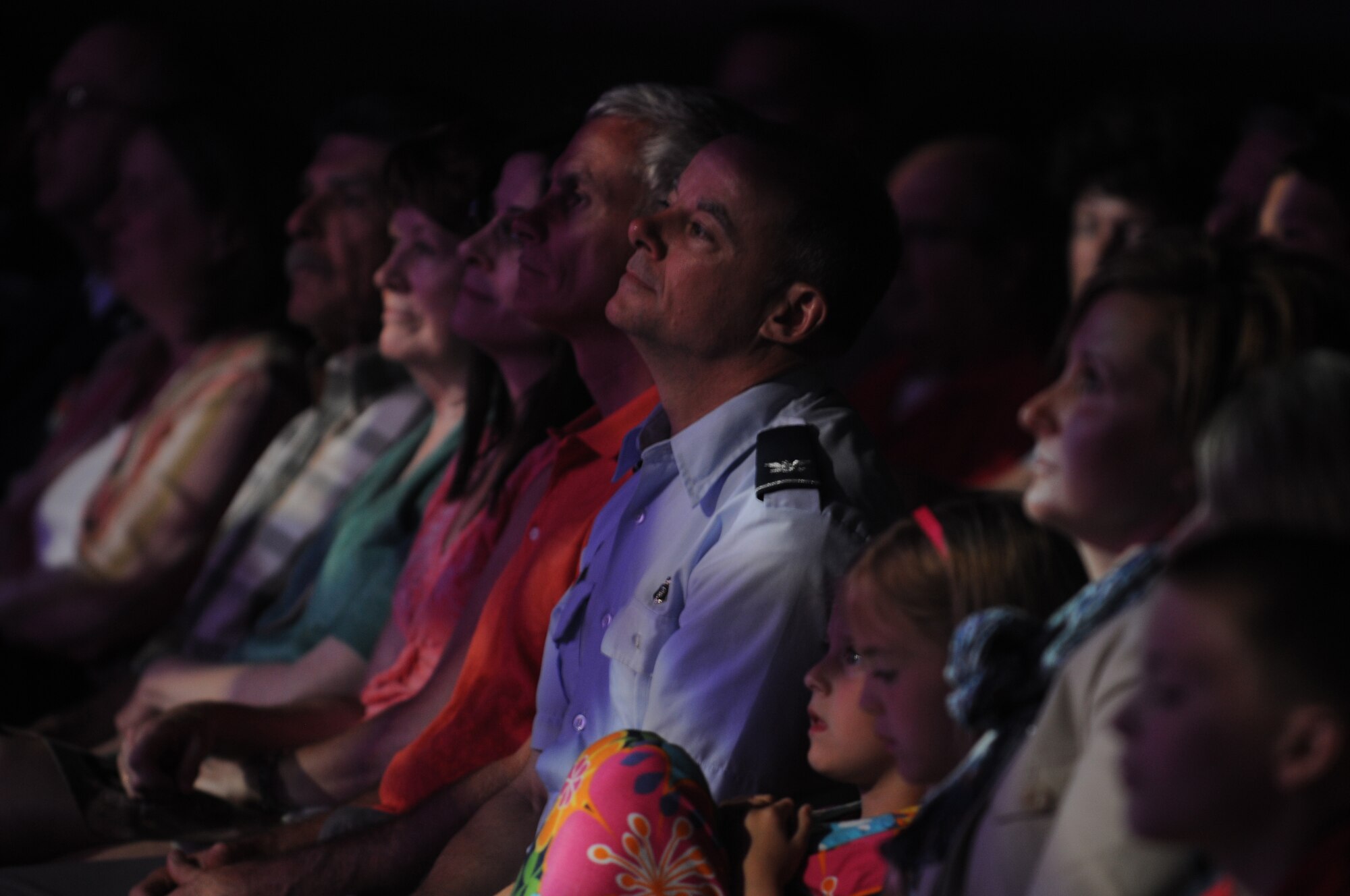 SAN ANGELO, Texas — Col. James Forrest, 17th Medical Group Commander, watches a performance by Tops in Blue June 1 at the San Angelo Coliseum. The 2011 tour consist of more than 60 locations across the world. (U.S. Air Force photo/Staff Sgt. Heather L. Rodgers)