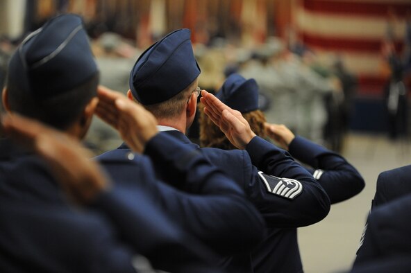 BARKSDALE AIR FORCE BASE, La. - Airmen of the Eighth Air Force render a salute to their outgoing commander, Maj. Gen. Floyd Carpenter, during the Eighth Air Force change-of-command ceremony held at Hoban Hall on Barksdale Air Force Base, La., June 3. General Carpenter relinquished command of "The Mighty Eighth" to Brig. Gen. Stephen Wilson. (U.S. Air Force photo by Airman 1st Class Micaiah Anthony)