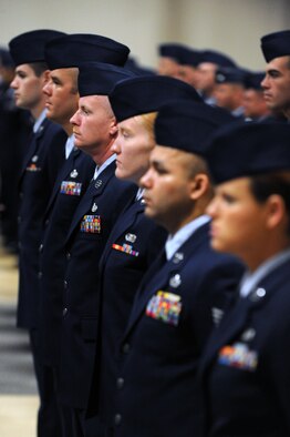 BARKSDALE AIR FORCE BASE, La. - Airmen of the 608th Air Operations Squadron stand at parade rest during the Eighth Air Force change-of-command ceremony held at Hoban Hall on Barksdale Air Force Base, La., June 3. Brig. Gen. Stephen Wilson accepted command of "The Mighty Eighth" during the ceremony. (U.S. Air Force photo by Airman 1st Class Micaiah Anthony)