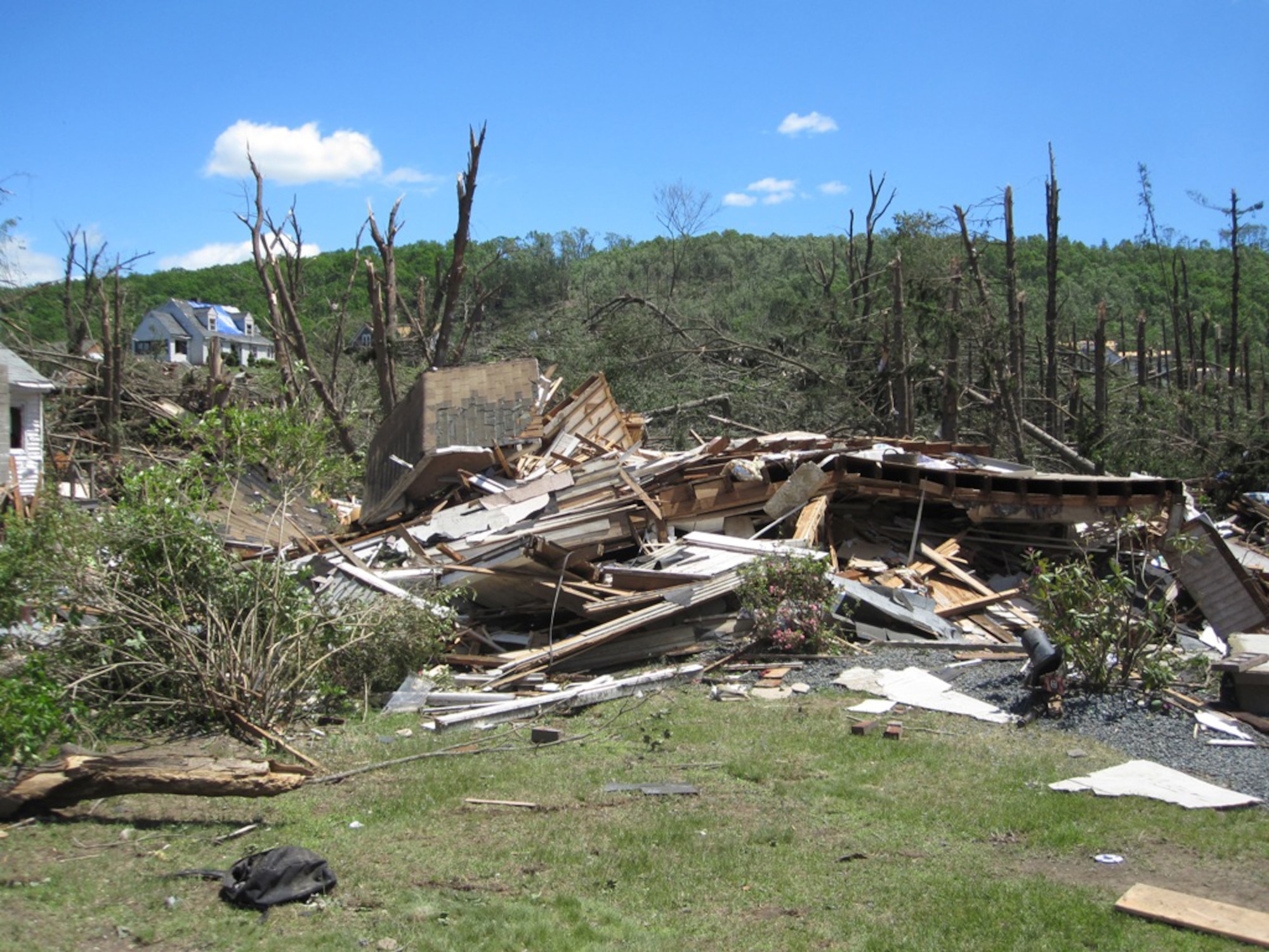Buildings in Monson, Mass., show the aftermath of a tornado that ripped through the area June 1, 2011. Firefighters from Westover Air Reserve Base, Mass., performed search and rescue the next day in Monson after two tornadoes left widespread damage in 19 communities across the area. (Courtesy photo/Capt. Robert Mancini)

