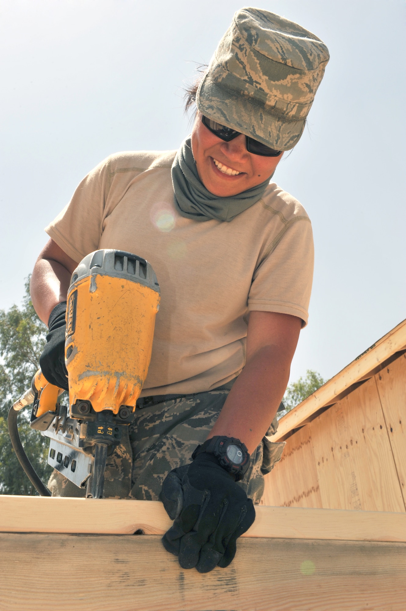 Senior Airman Ingrid Tamayo assembles rough framing of an exterior wall May 23, 2011, at a combat outpost in Afghanistan. Airman Tamayo is a structural journeyman assigned to the 577th Expeditionary Prime Base Engineer Emergency Force Squadron. (U.S. Air Force photo/Senior Airman Sheila deVera) 