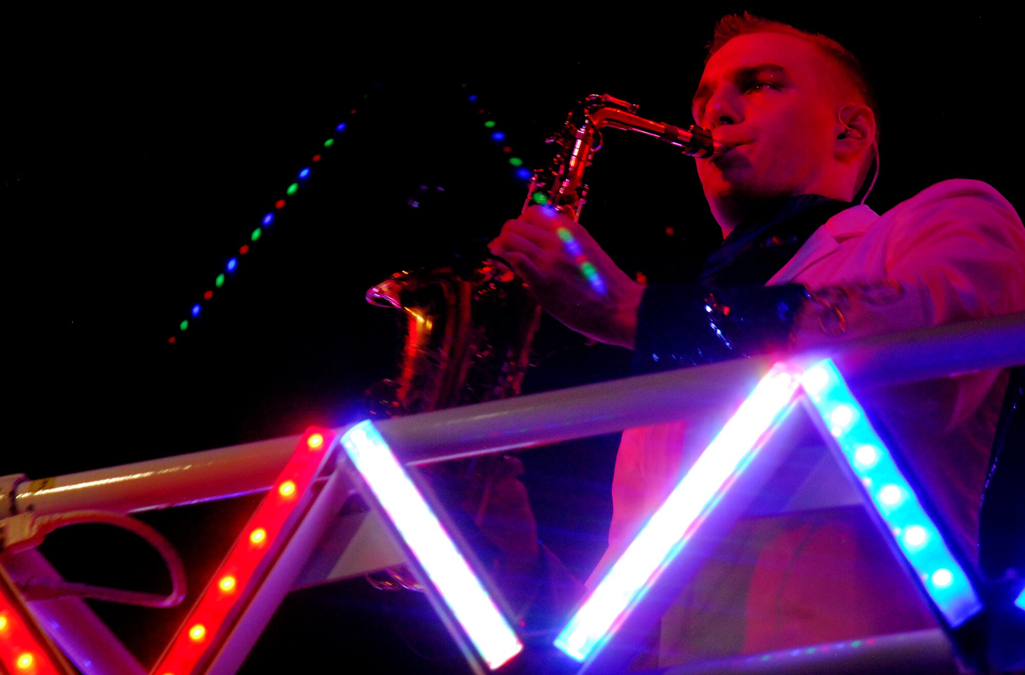 SAN ANGELO, Texas-- Airman 1st Class Ryan Ratkowski, Tops in Blue 2011 saxophonist, performs at the San Angelo Coliseum June 1 to a crowd of more than 1,100 people. San Angelo was the third stop on the group's 2011tour list, which includes a variety of stateside bases, Europe, and even Asia. The Air Force's premier entertainment showcase was free and open to the public.  (U.S. Air Force photo/Airman 1st Class Michael Smith) 