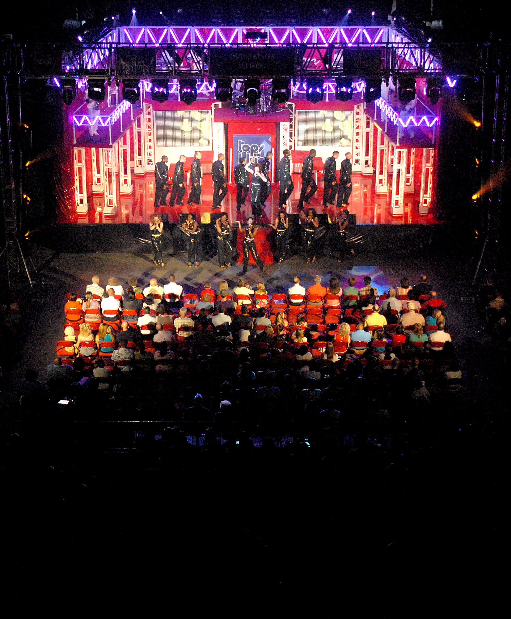 SAN ANGELO, Texas-- Tops in Blue dancers and vocalists perform a routine for a crowd of more than 1,100 people gathered at the San Angelo Coliseum June 1 for the group's Rhythm Nation show. San Angelo was the third stop on their 2011 tour list, which includes a variety of stateside bases, Europe, and even Asia. The show was free and open to the public.  (U.S. Air Force photo/Airman 1st Class Michael Smith) 