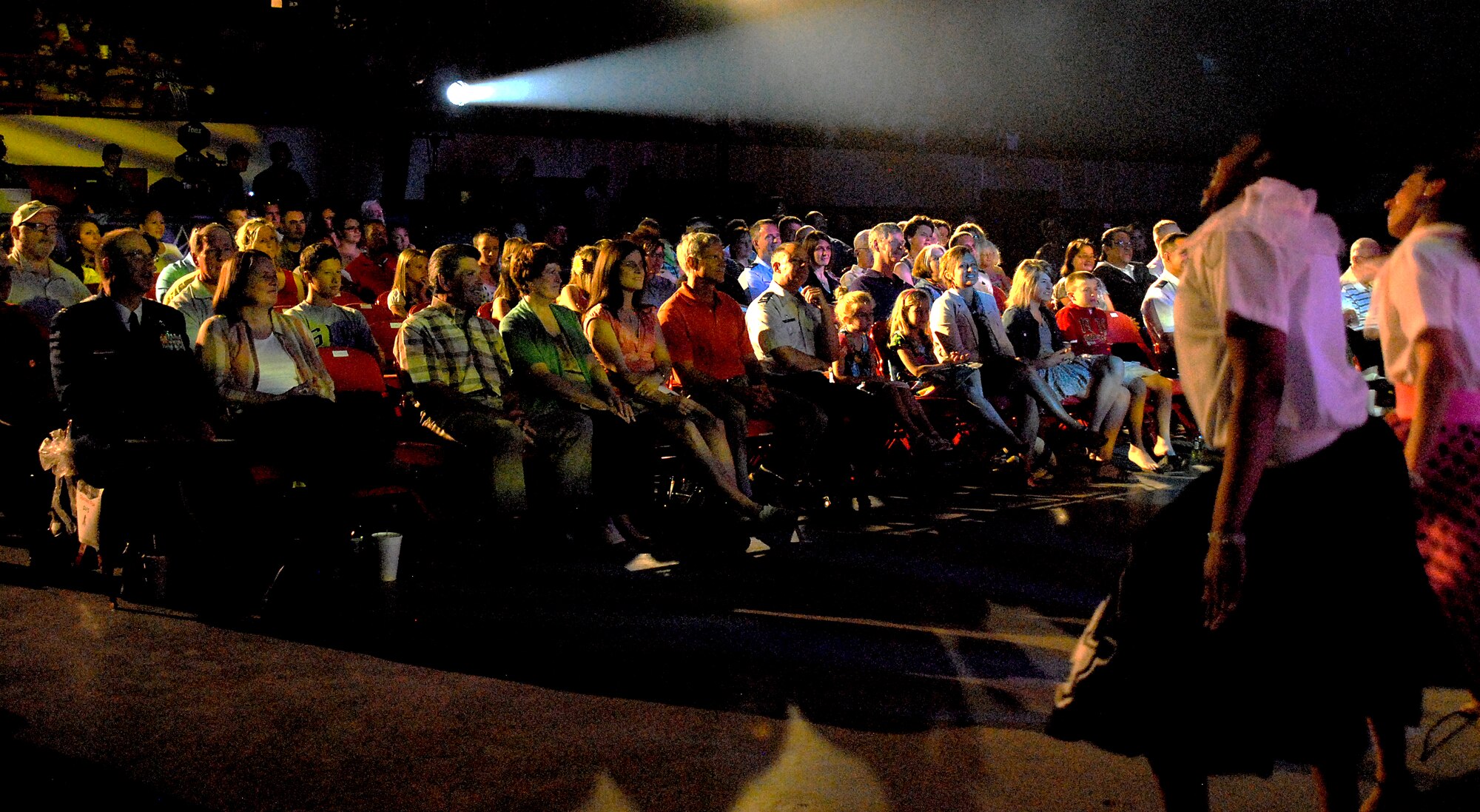 SAN ANGELO, Texas-- Tops in Blue dancers and vocalists perform a routine for the crowd, including Team Goodfellow distinguished visitors, at the San Angelo Coliseum June 1. San Angelo was the third stop on their long tour list, which includes a variety of stateside bases, Europe, and even Asia. (U.S. Air Force photo/Airman 1st Class Michael Smith) 