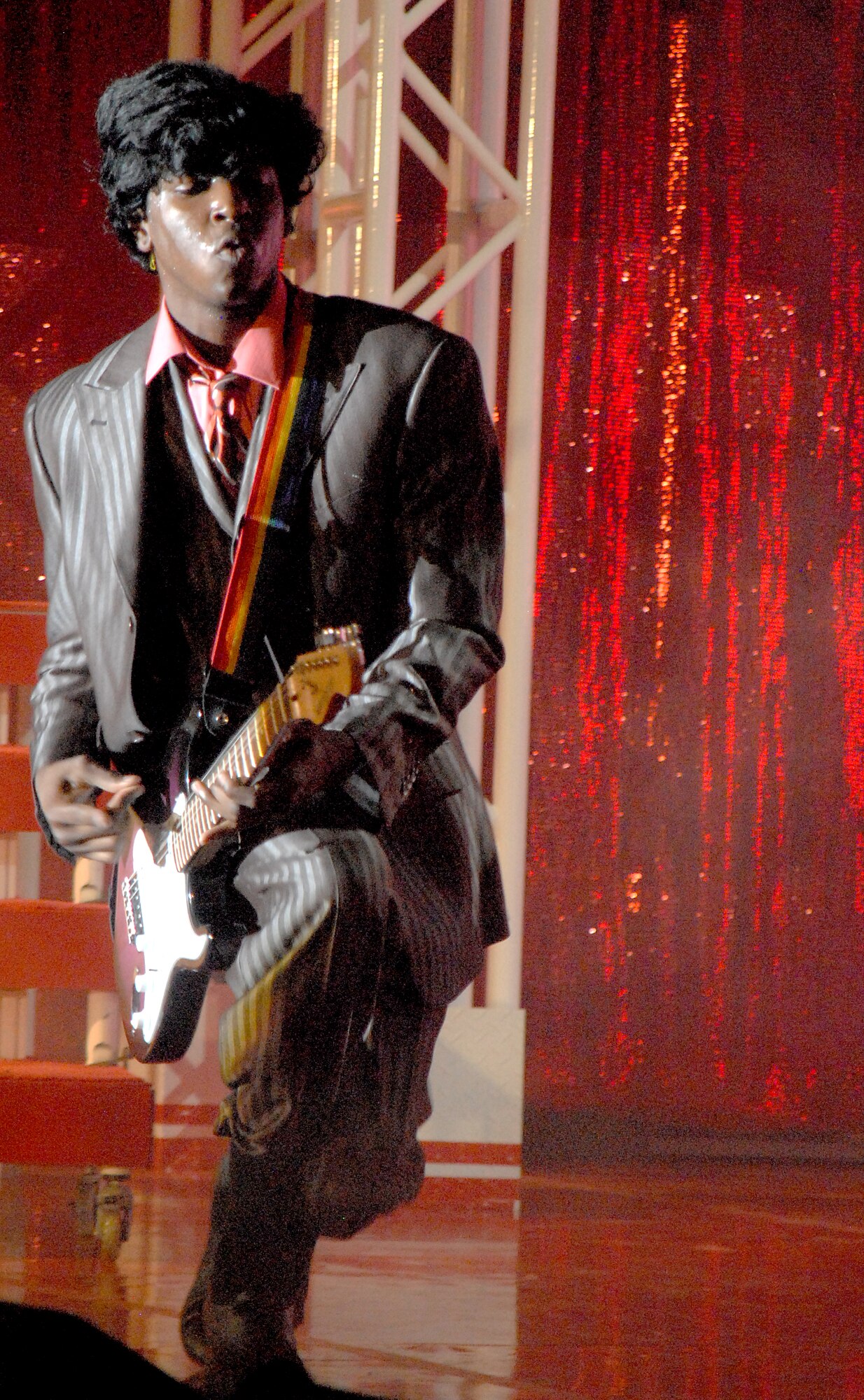 SAN ANGELO, Texas-- Airman 1st Class Steve Pearson, Tops in Blue 2011 vocalist, dresses up as singer/guitarist Chuck Berry for his performance at the San Angelo Coliseum June 1. San Angelo was the third stop on their 2011 tour list, which includes a variety of stateside bases, Europe, and even Asia. (U.S. Air Force photo/Airman 1st Class Michael Smith) 