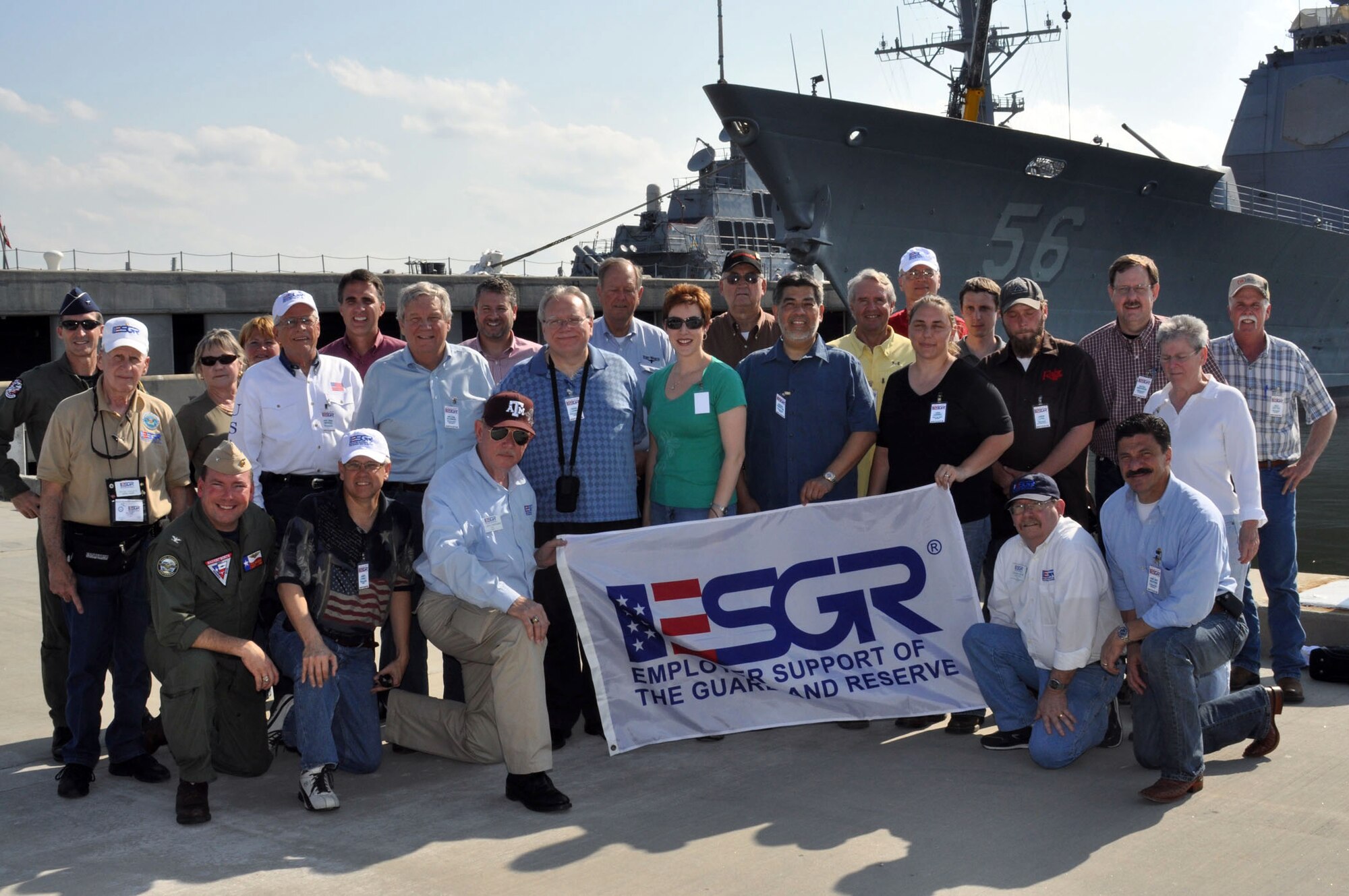 Members and military personnel from the Texas ESGR "bosslift" pose for a group photo in front of the USS San Jacinto CG56 at Naval Station Norfolk, Va., May 25, 2011. The ship, nicknamed "San Jac", is named in honor of the Battle of San Jacinto, the decisive battle of the Texas Revolution. (U.S. Air Force photo/Staff Sgt. Chris Bolen)