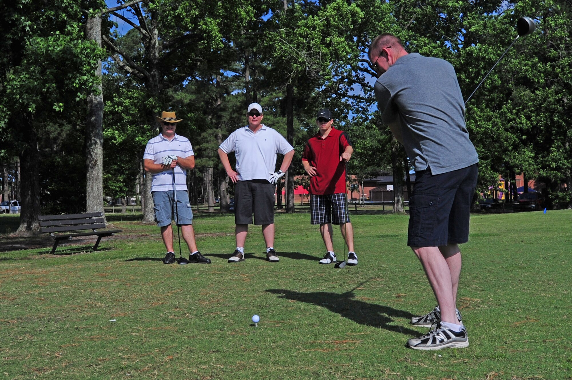 SEYMOUR JOHNSON AIR FORCE BASE, N.C. - Airman 1st Class Jerry Puckett competes in a golf tournament during Wing Sports Day here June 3, 2011. Col. Patrick Doherty, 4th Fighter Wing commander and Command Chief Blake Malpass held Wing Sports Day to kick off the Critical Days of Summer. Airman Puckett, 4th Logistics Readiness Squadron vehicle operator, hails from Meadows, Va. (U.S. Air Force photo/Senior Airman Rae Perry) (RELEASED)