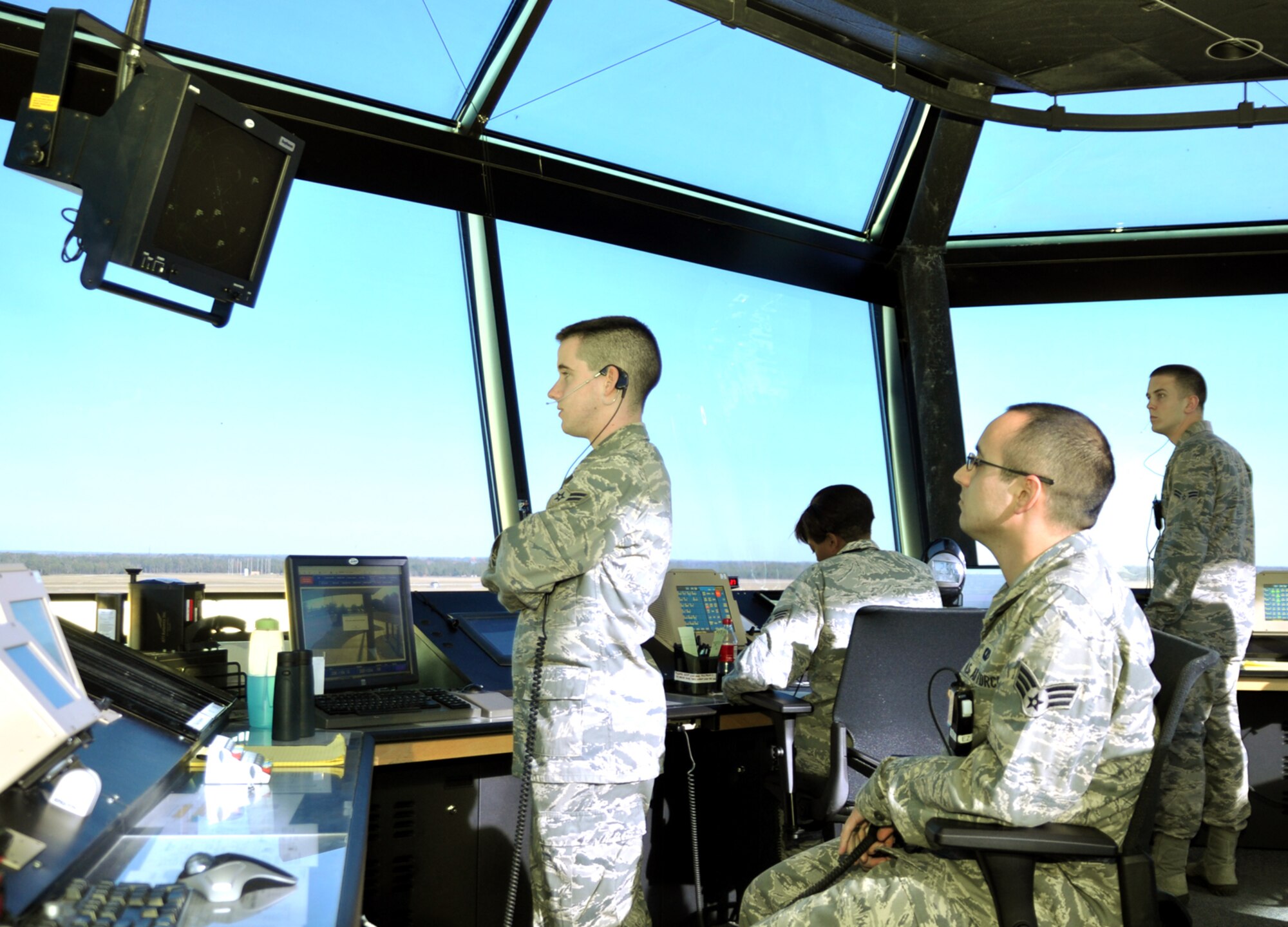 Air Traffic Controllers from the 14th Operations Support Squadron keep an eye on the sky during a busy day at the Air Traffic Control Tower. According to the fiscal year 2010 USAF Air Traffic Activity Report from the AF Flight Standards Agency, Columbus Air Force Base contains the busiest Air Traffic Control complex in the USAF at 410,764 combined operations. (U.S. Air Force photo/Airman 1st Class Chase Hedrick)