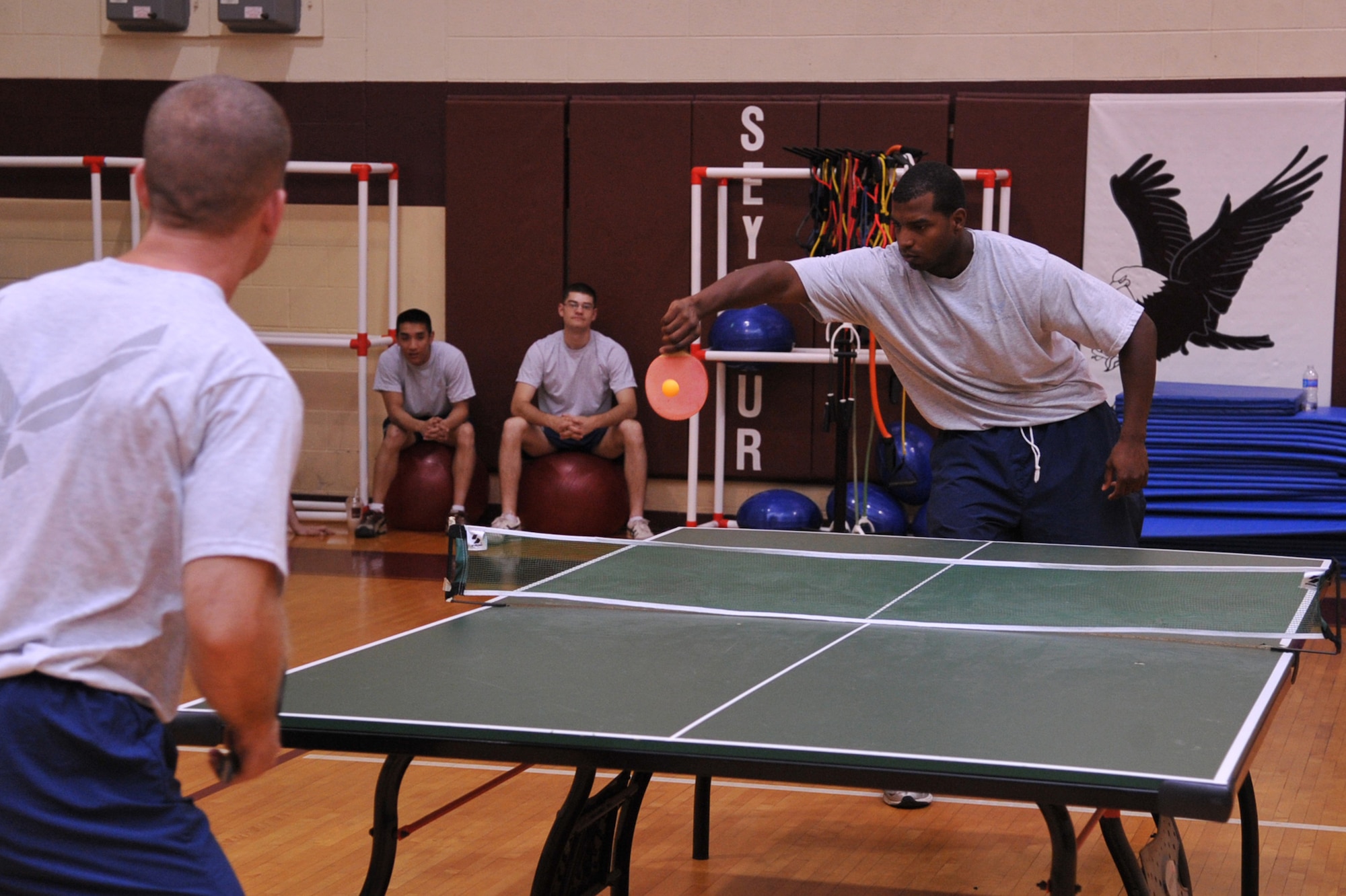 SEYMOUR JOHNSON AIR FORCE BASE, N.C.- Airman 1st Class Matthew Carothers hits a ball during the ping pong competition as part of Wing Sports Day here, June 3, 2011. Airman Carothers played against Staff Sgt. Danny Plunkett for a slot in the semi-finals. Airman Carothers is a 4th Force Support Squadron personnel customer support representative, and hails from Chicago. Sergeant Plunkett is a 4th Logistic Readiness Squadron vehicle mechanic, and a native of Ruston, La. (U.S. Air Force photo/Senior Airman Whitney Lambert)(RELEASED)