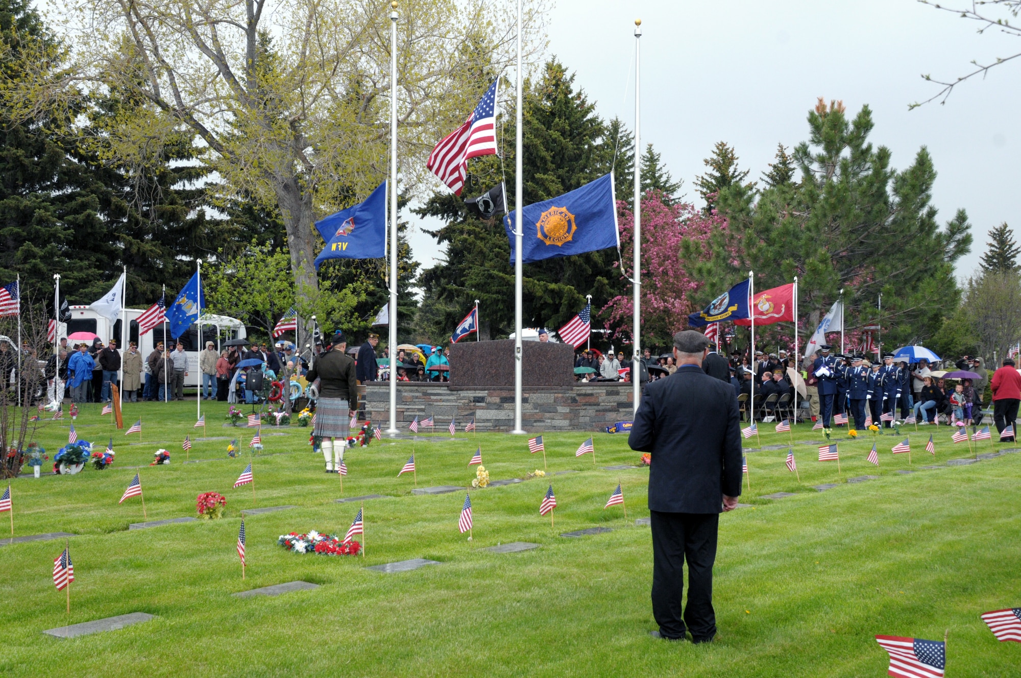 Members of the Cheyenne community came together with military members in the area at Beth El Cemetery in Cheyenne, Wyo., May 30 to pay respects to those who have given their lives in service. (U.S. Air Force photo by Blaze Lipowski)